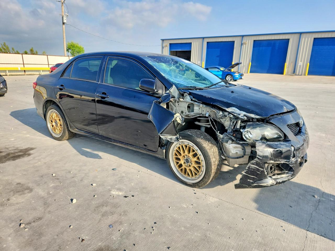 2010 Toyota Corolla Le Black vin: JTDBU4EE1AJ075682