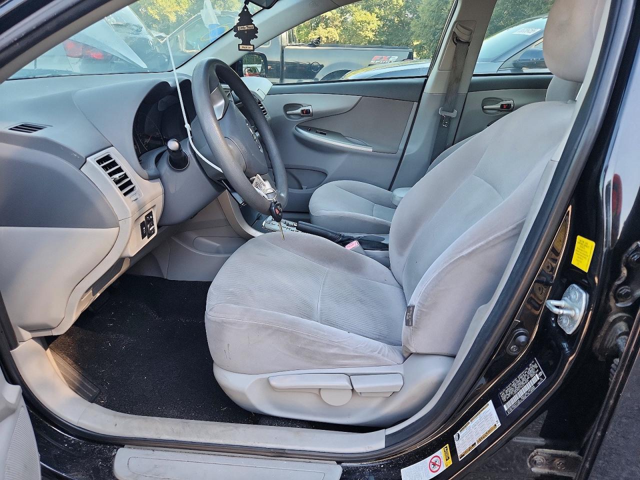 2010 Toyota Corolla Le Black vin: JTDBU4EE1AJ077836