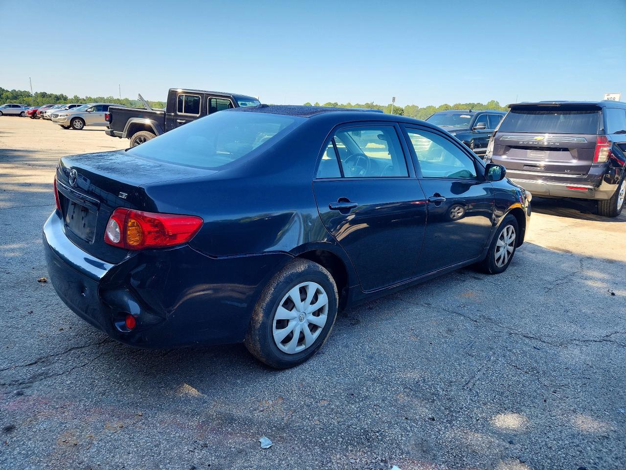 2010 Toyota Corolla Le Black vin: JTDBU4EE1AJ077836
