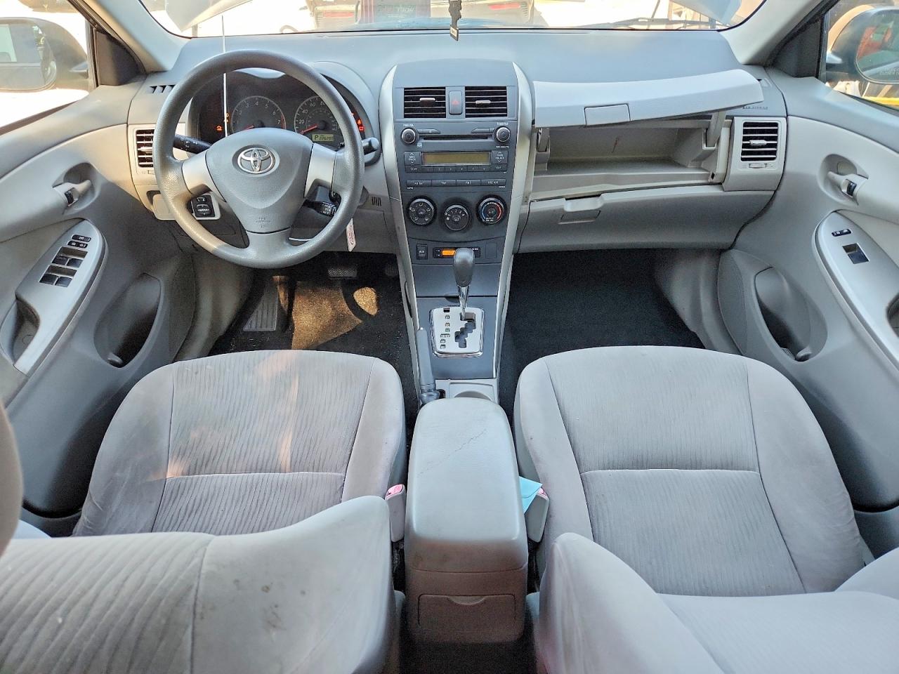 2010 Toyota Corolla Le Black vin: JTDBU4EE1AJ077836