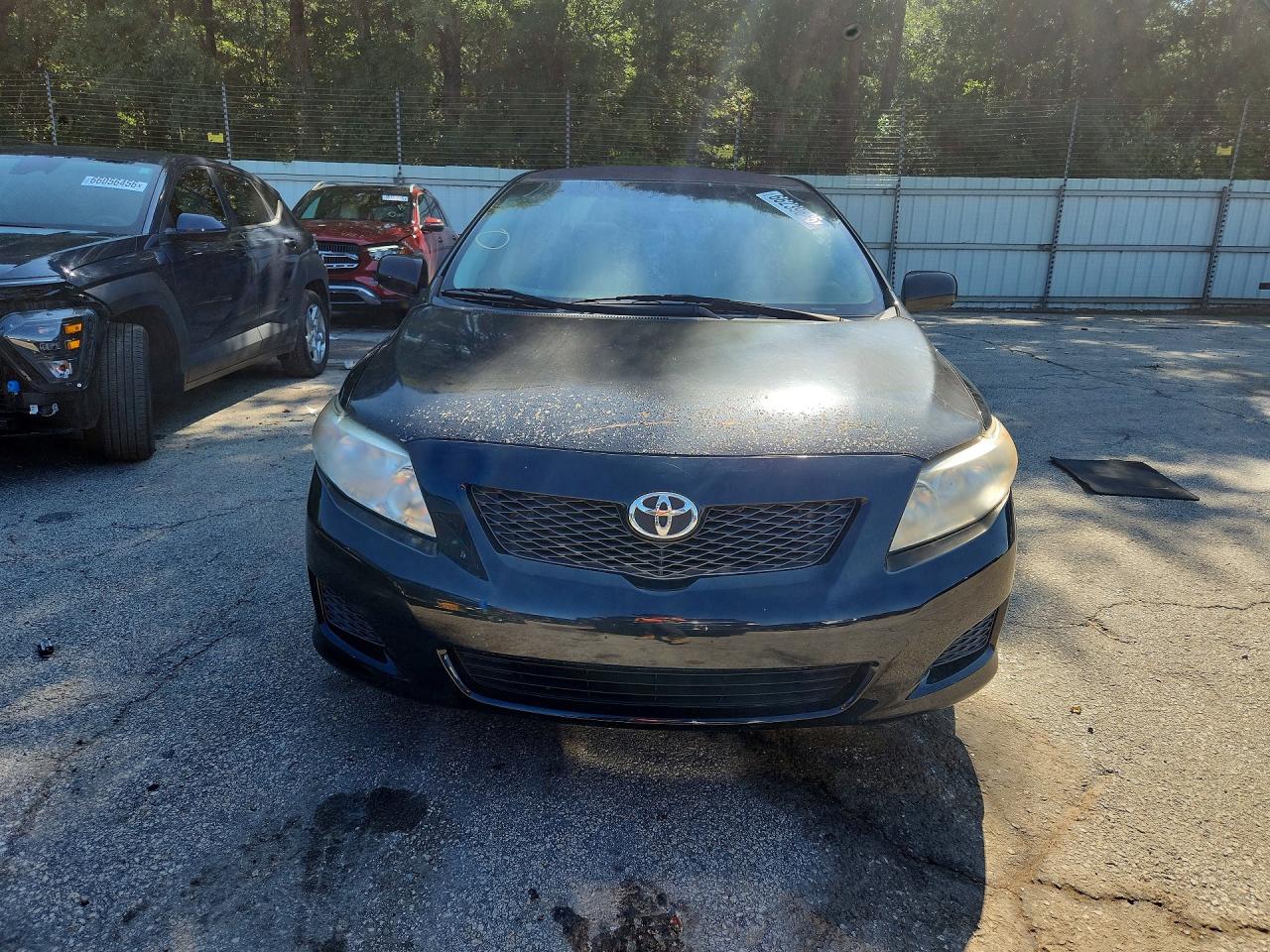 2010 Toyota Corolla Le Black vin: JTDBU4EE1AJ077836