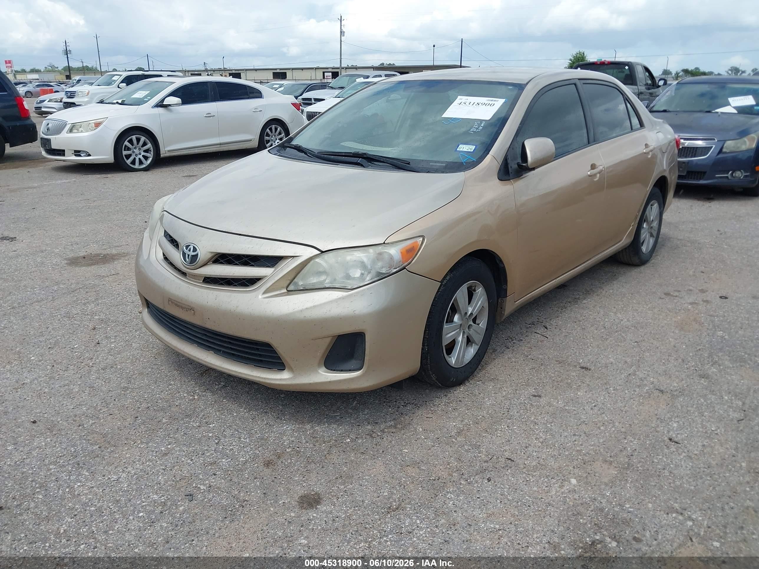 2011 Toyota Corolla Le Gold vin: JTDBU4EE1B9141375