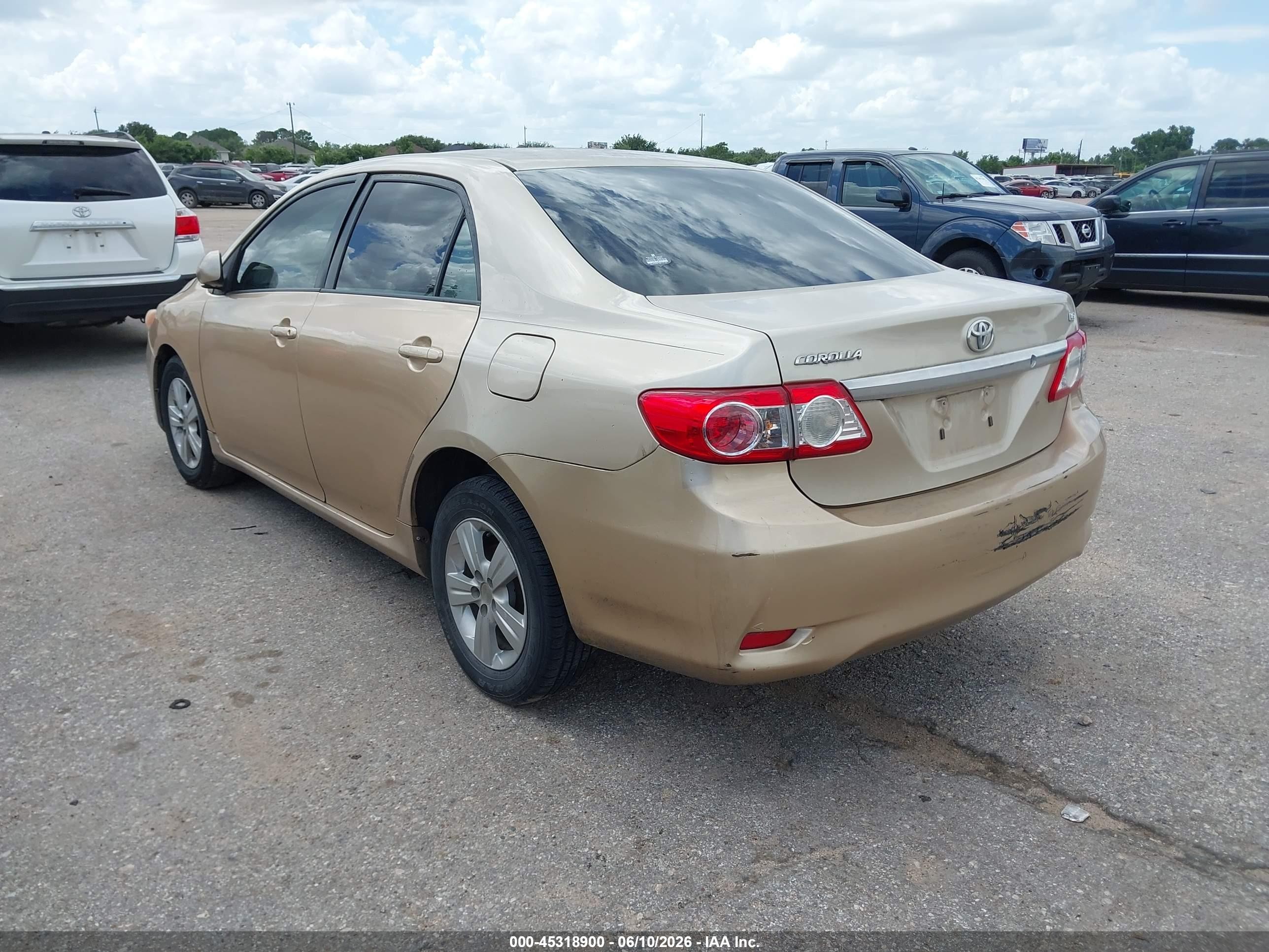 2011 Toyota Corolla Le Gold vin: JTDBU4EE1B9141375