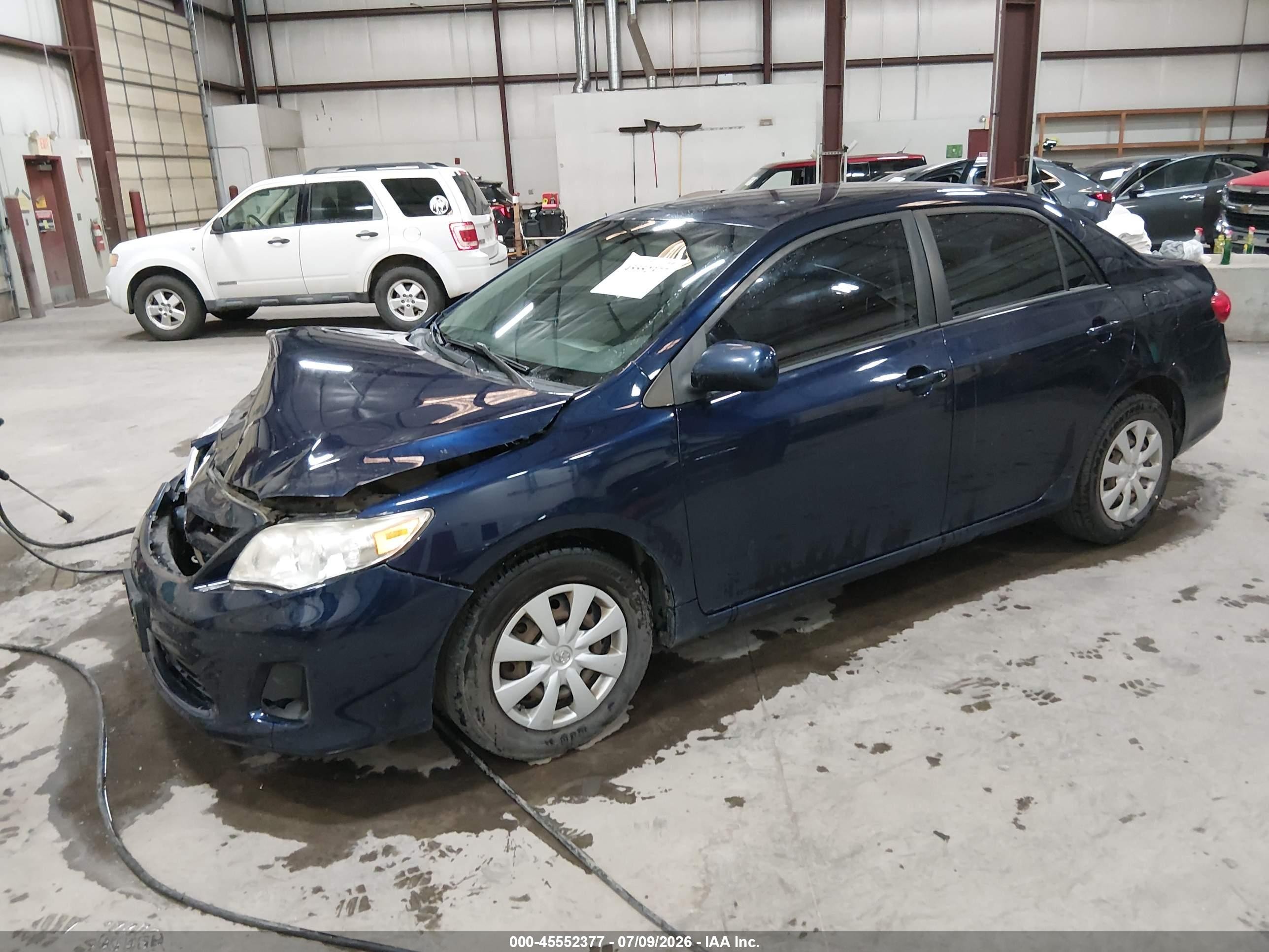 2011 Toyota Corolla Le Blue vin: JTDBU4EE1B9142347