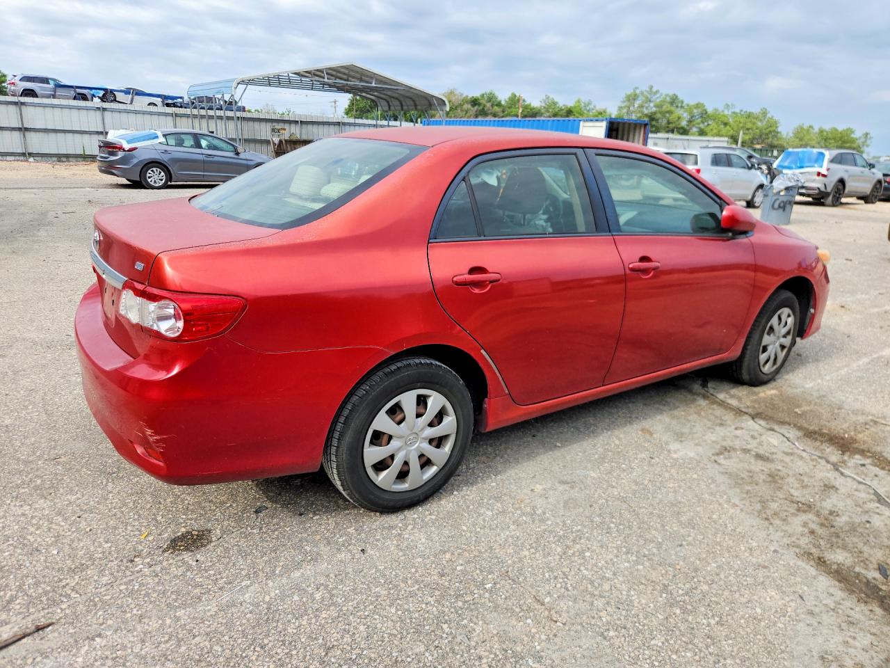 2011 Toyota Corolla Le Red vin: JTDBU4EE1B9155731