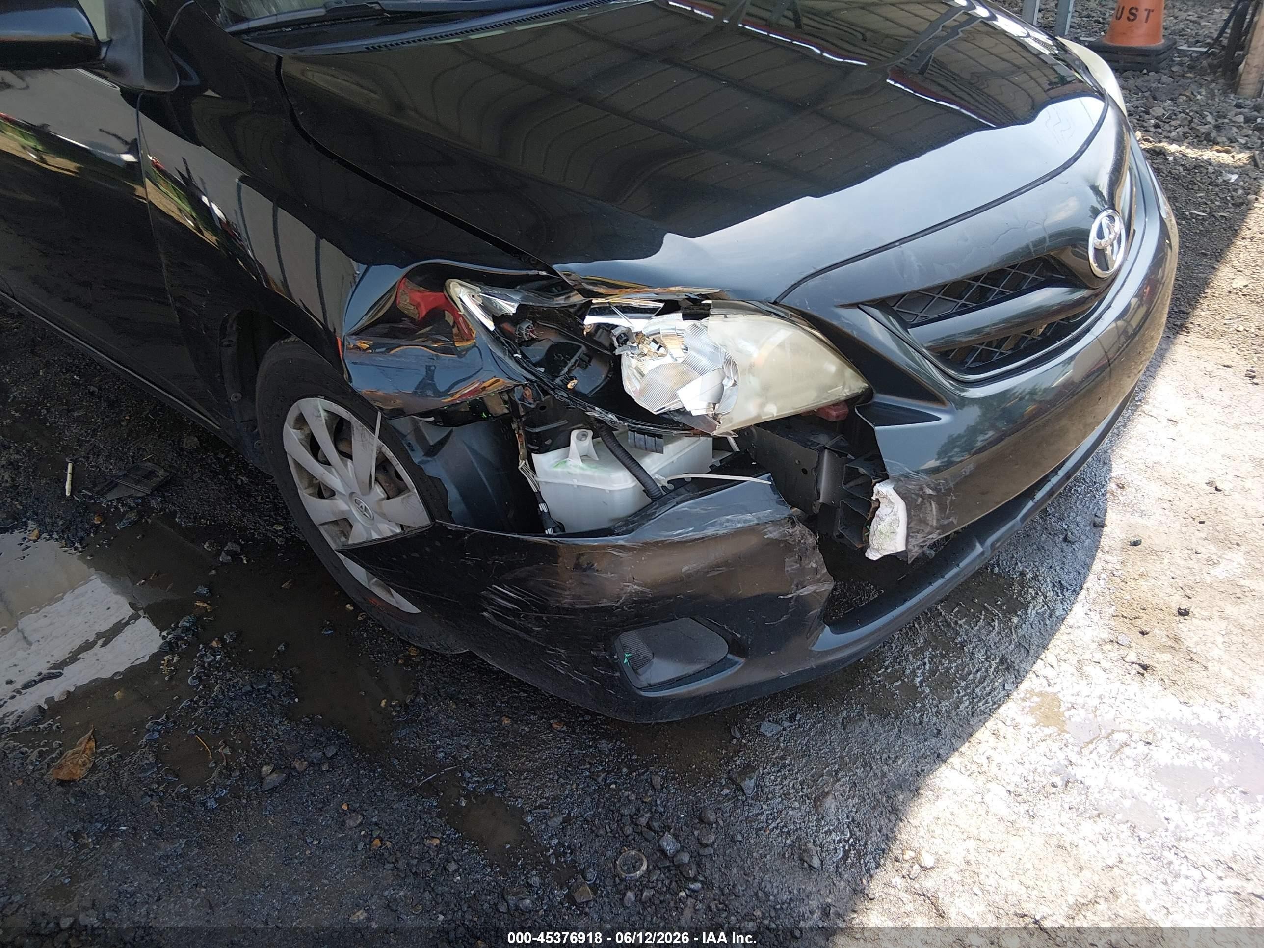 2011 Toyota Corolla Le Black vin: JTDBU4EE1BJ097134