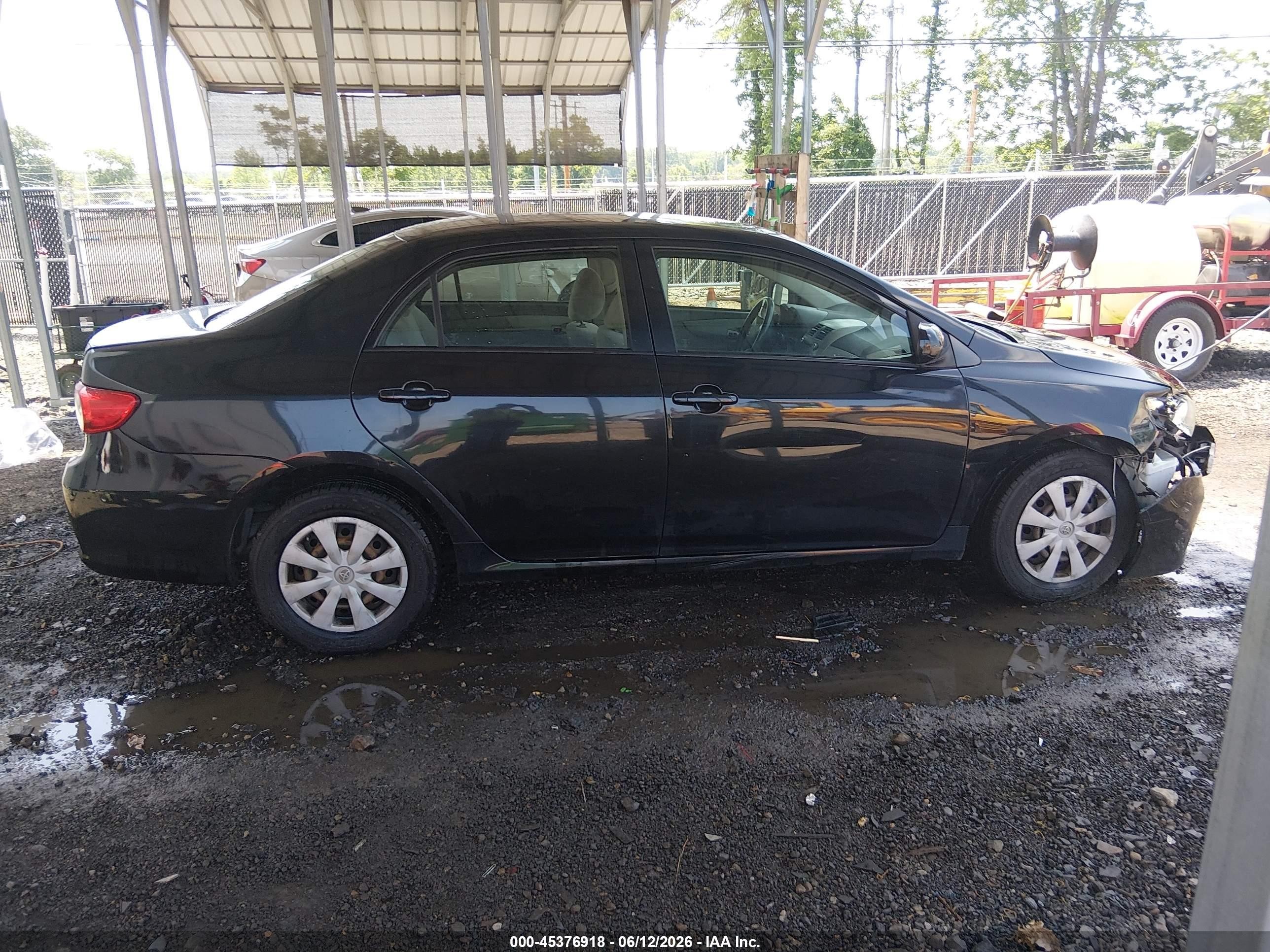 2011 Toyota Corolla Le Black vin: JTDBU4EE1BJ097134