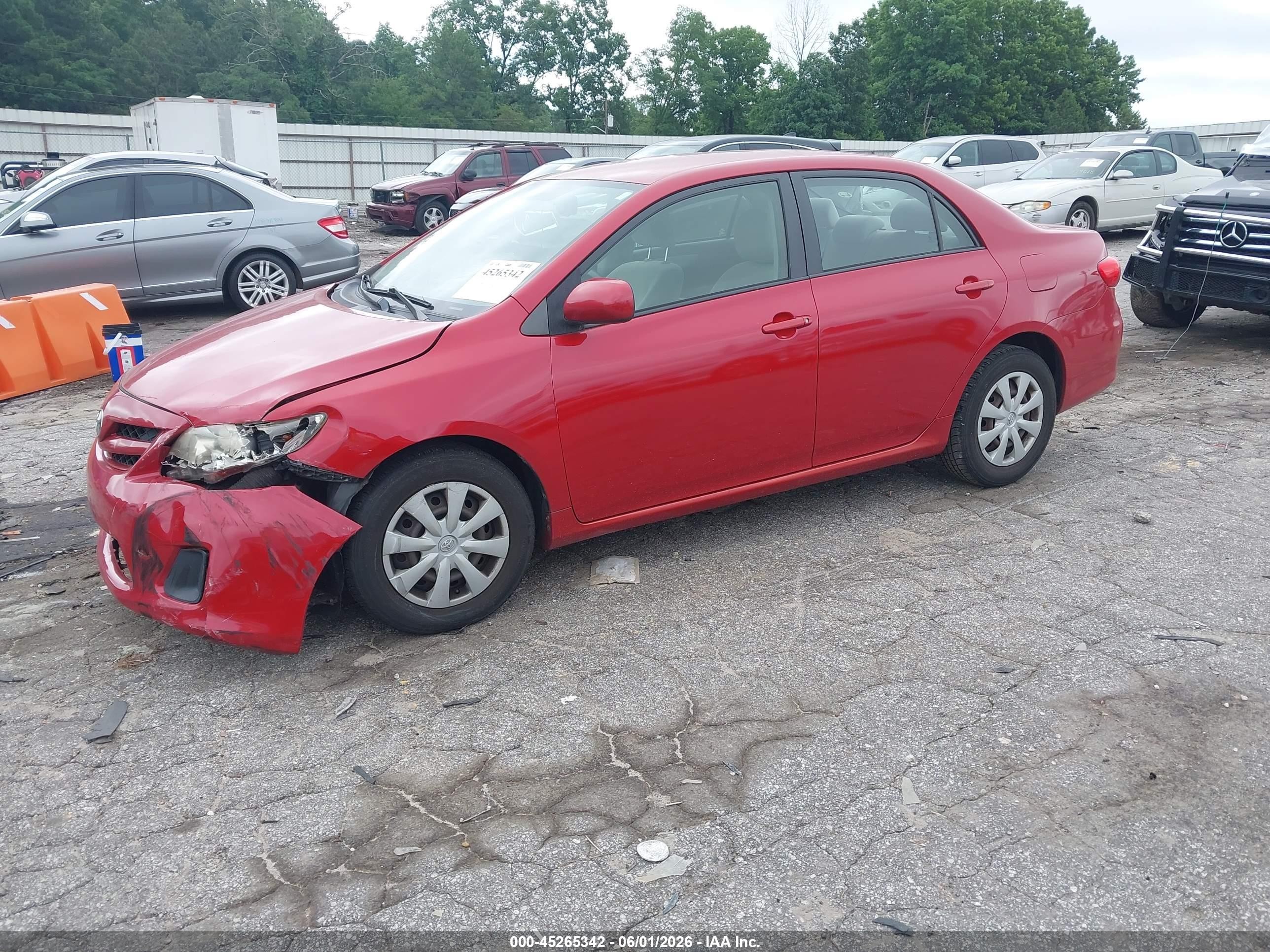 2011 Toyota Corolla Le Red vin: JTDBU4EE1BJ097599