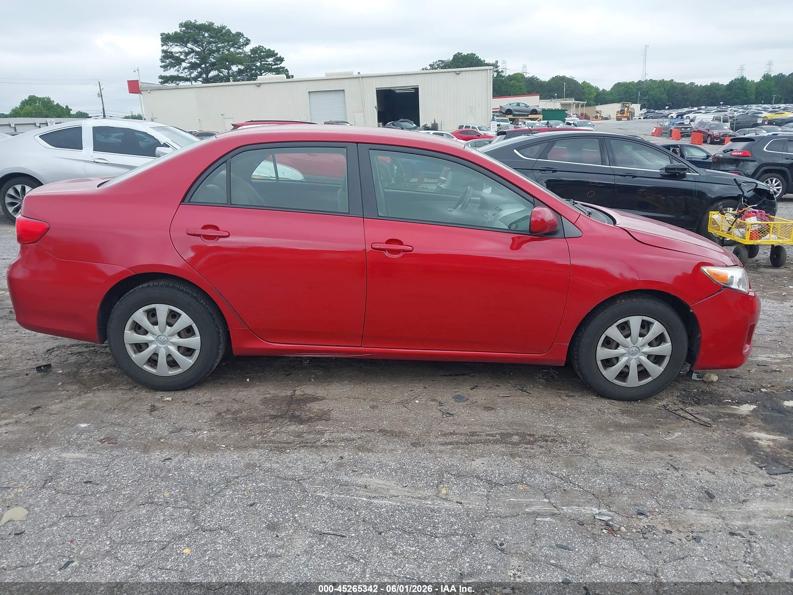 2011 Toyota Corolla Le Red vin: JTDBU4EE1BJ097599