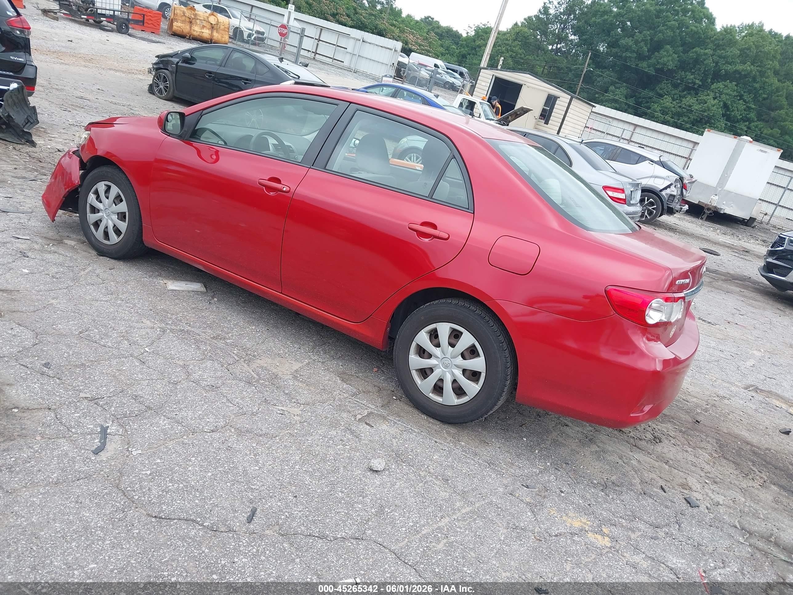 2011 Toyota Corolla Le Red vin: JTDBU4EE1BJ097599