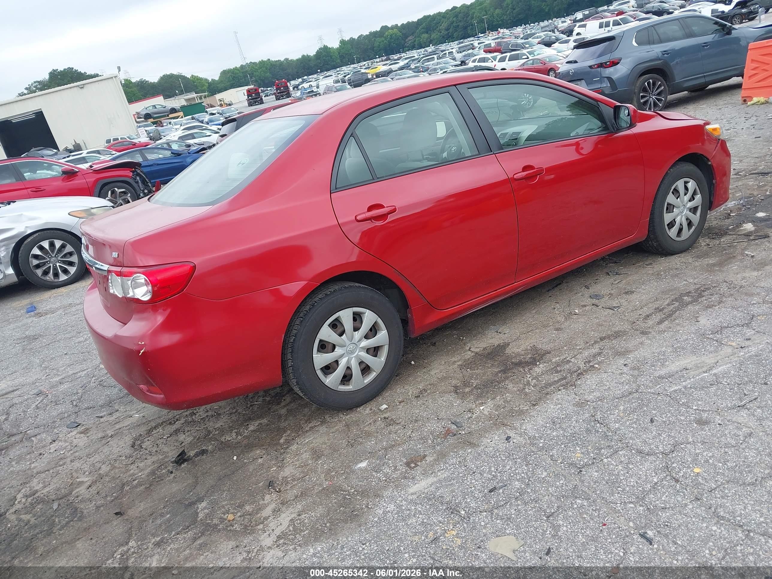 2011 Toyota Corolla Le Red vin: JTDBU4EE1BJ097599