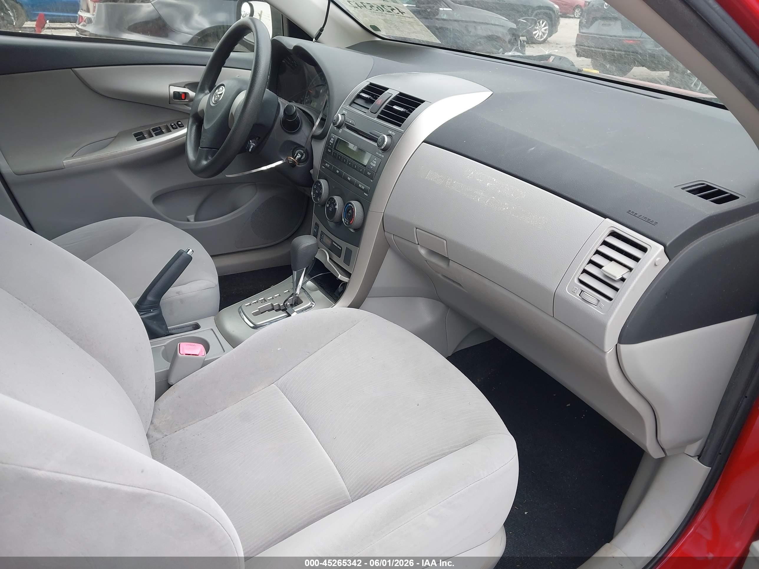 2011 Toyota Corolla Le Red vin: JTDBU4EE1BJ097599