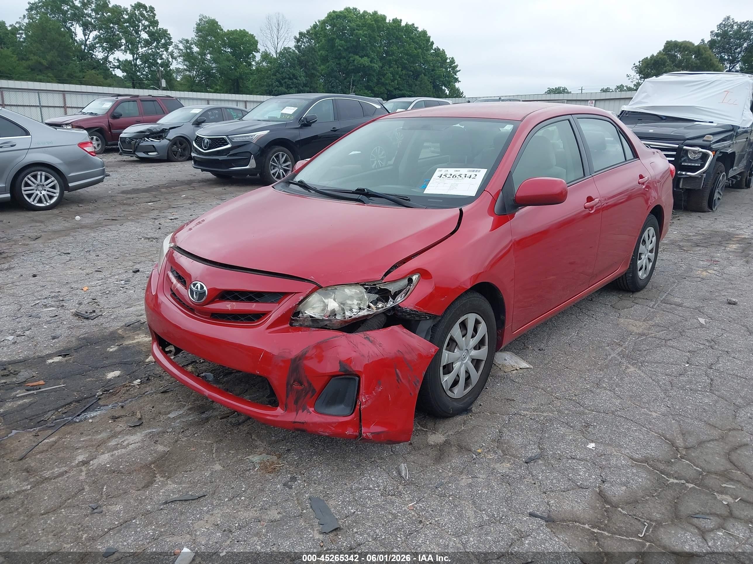 2011 Toyota Corolla Le Red vin: JTDBU4EE1BJ097599