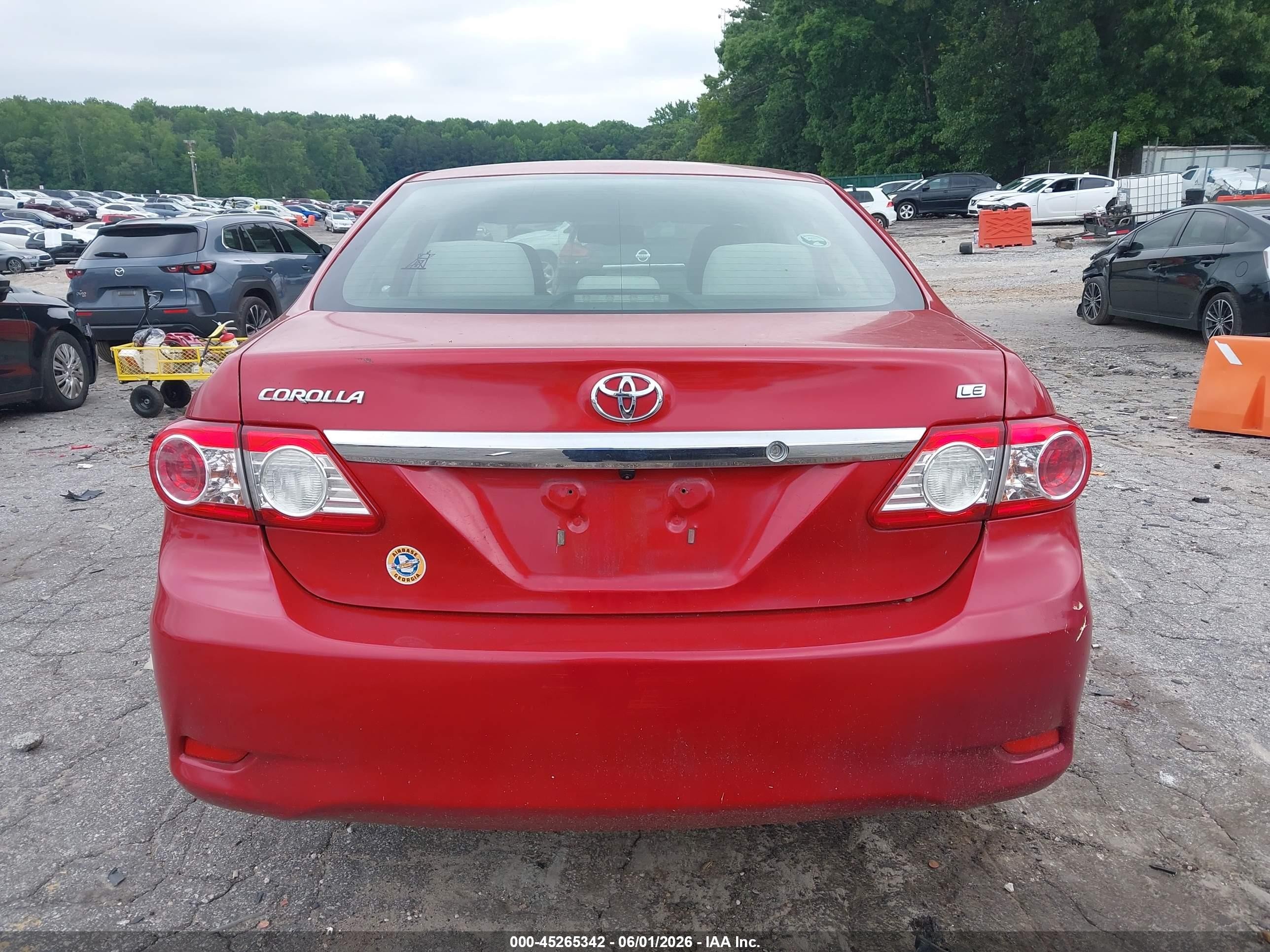 2011 Toyota Corolla Le Red vin: JTDBU4EE1BJ097599