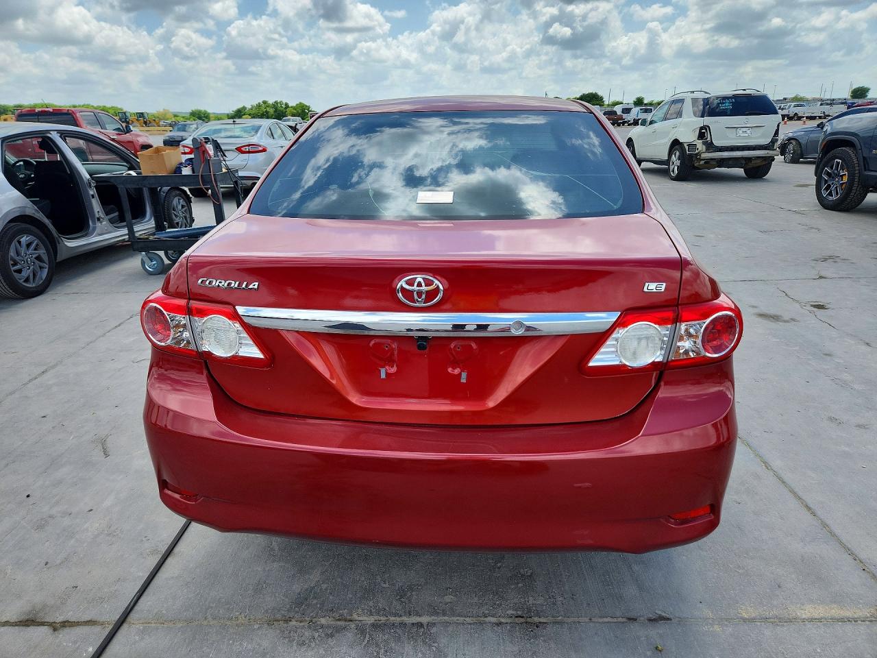 2012 Toyota Corolla Le Red vin: JTDBU4EE1C9176130