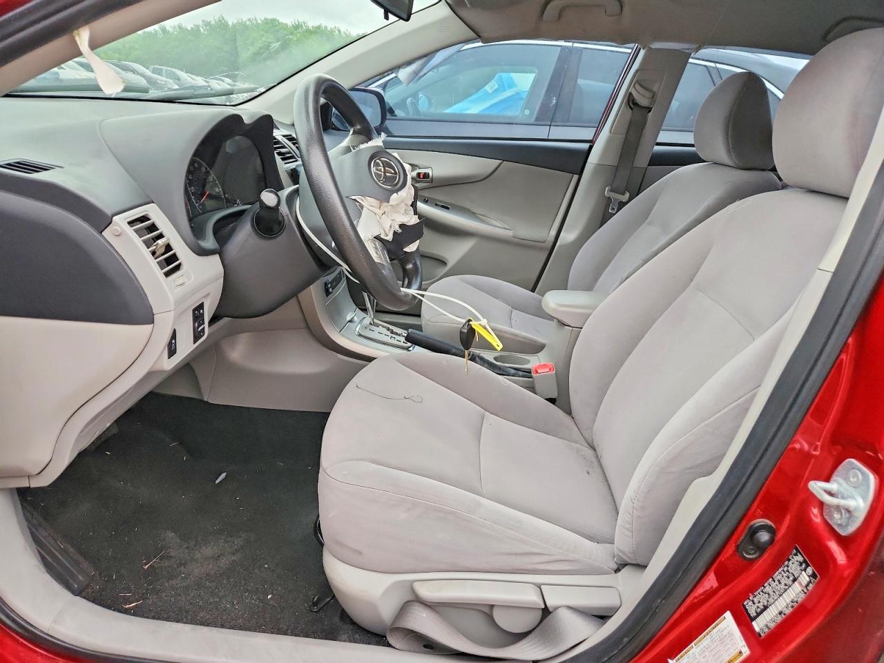 2012 Toyota Corolla Le Red vin: JTDBU4EE1C9176130