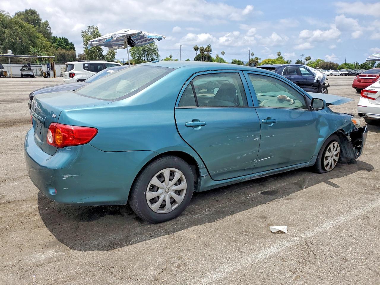 2010 Toyota Corolla Le Teal vin: JTDBU4EE2A9110683