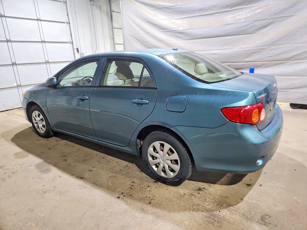 2010 Toyota Corolla Le Green vin: JTDBU4EE2A9115396