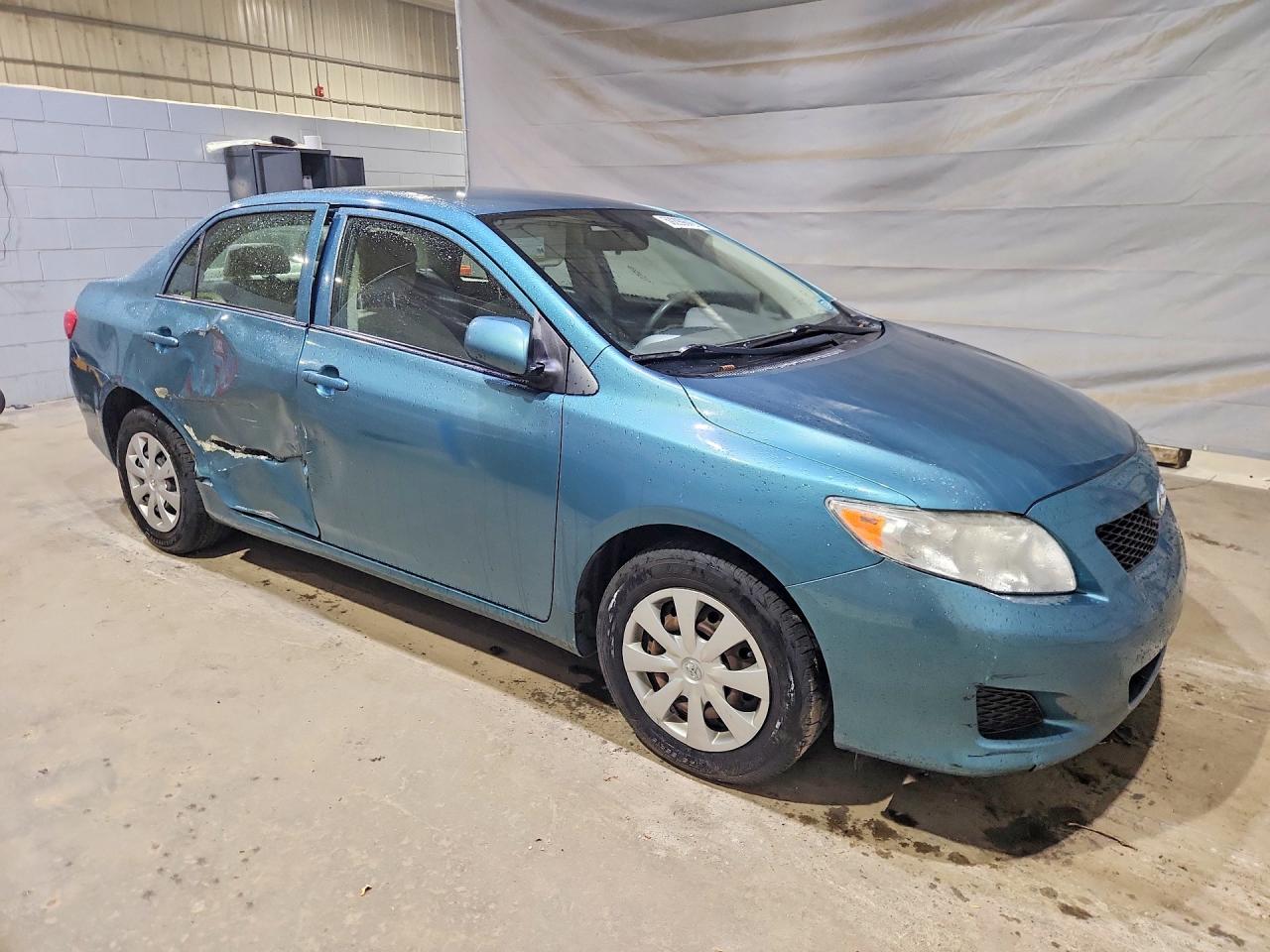 2010 Toyota Corolla Le Green vin: JTDBU4EE2A9115396
