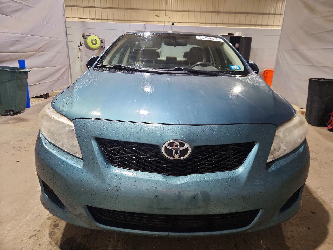 2010 Toyota Corolla Le Green vin: JTDBU4EE2A9115396