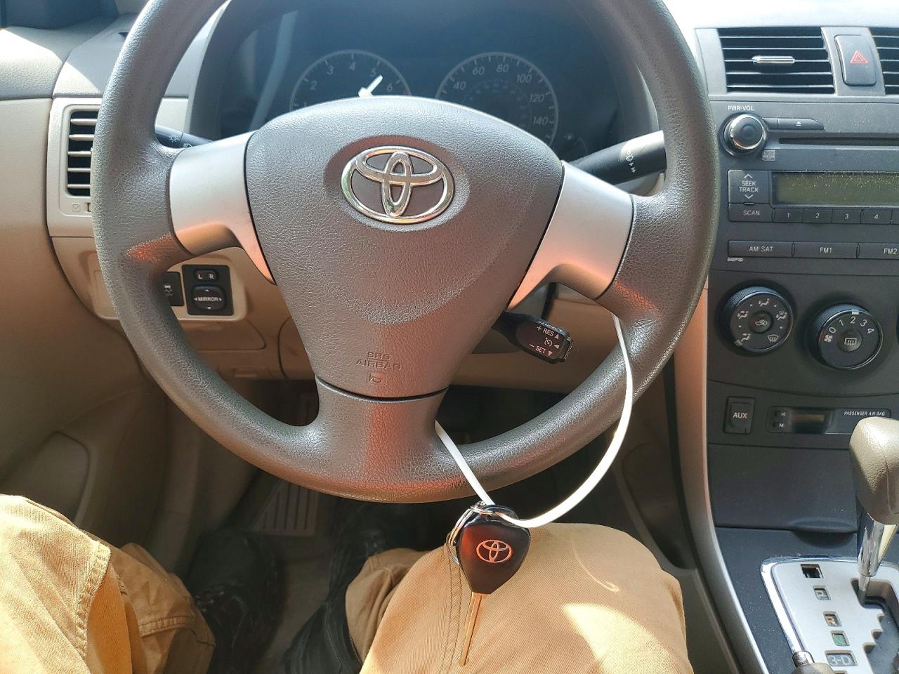 2010 Toyota Corolla Le Teal vin: JTDBU4EE2A9121246