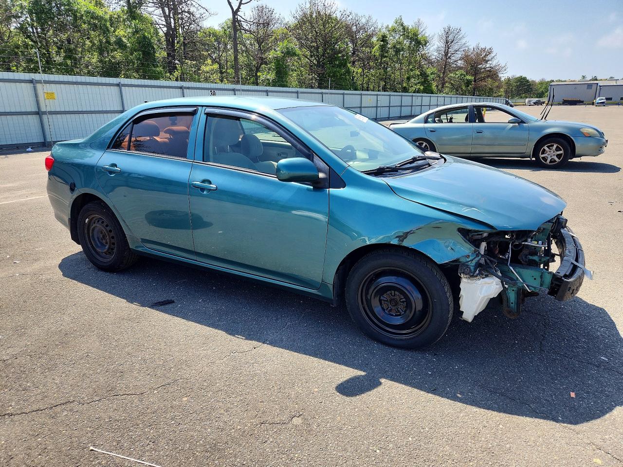 2010 Toyota Corolla Le Blue vin: JTDBU4EE2A9123420