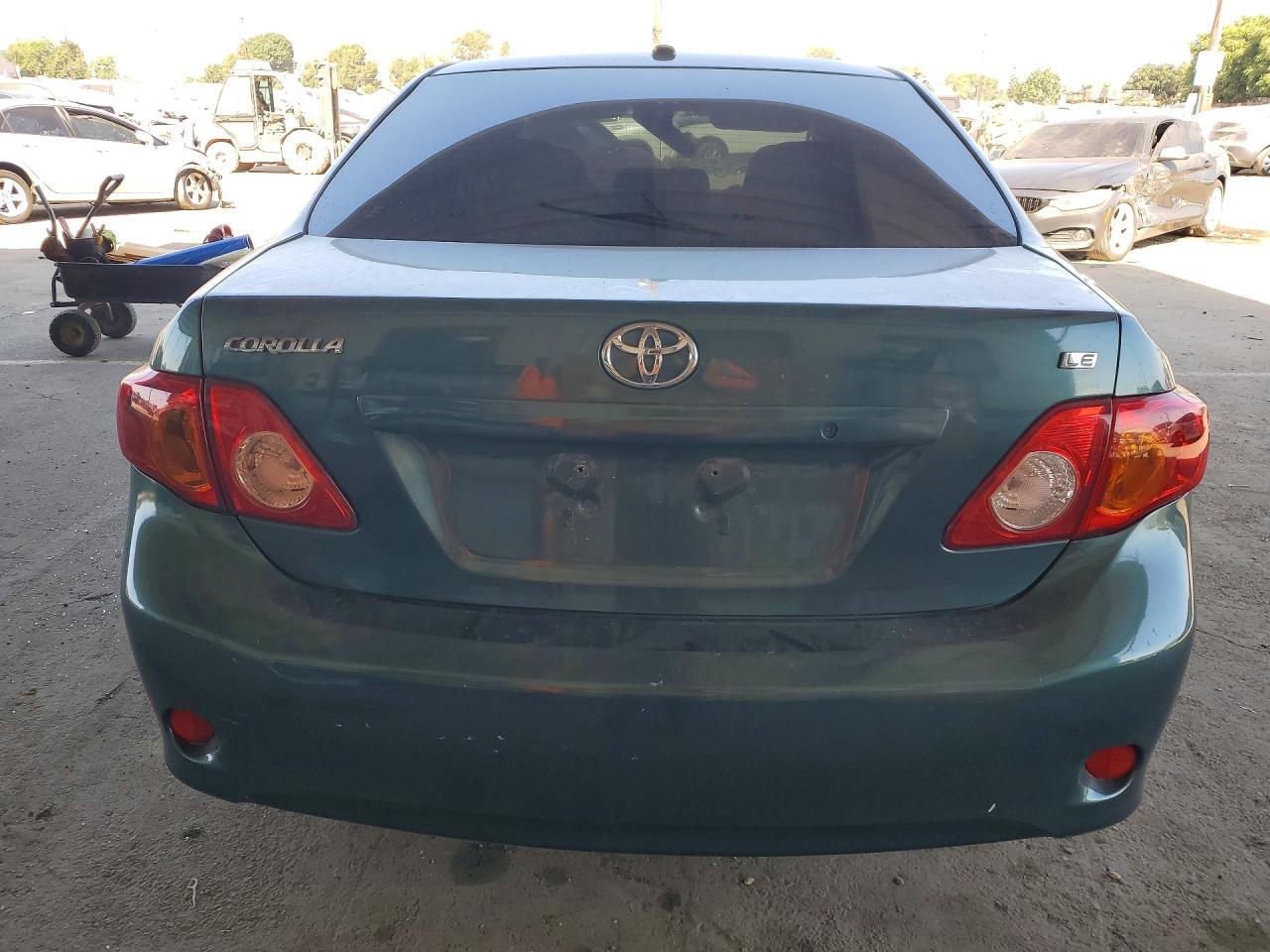 2010 Toyota Corolla Le Green vin: JTDBU4EE2AJ055277