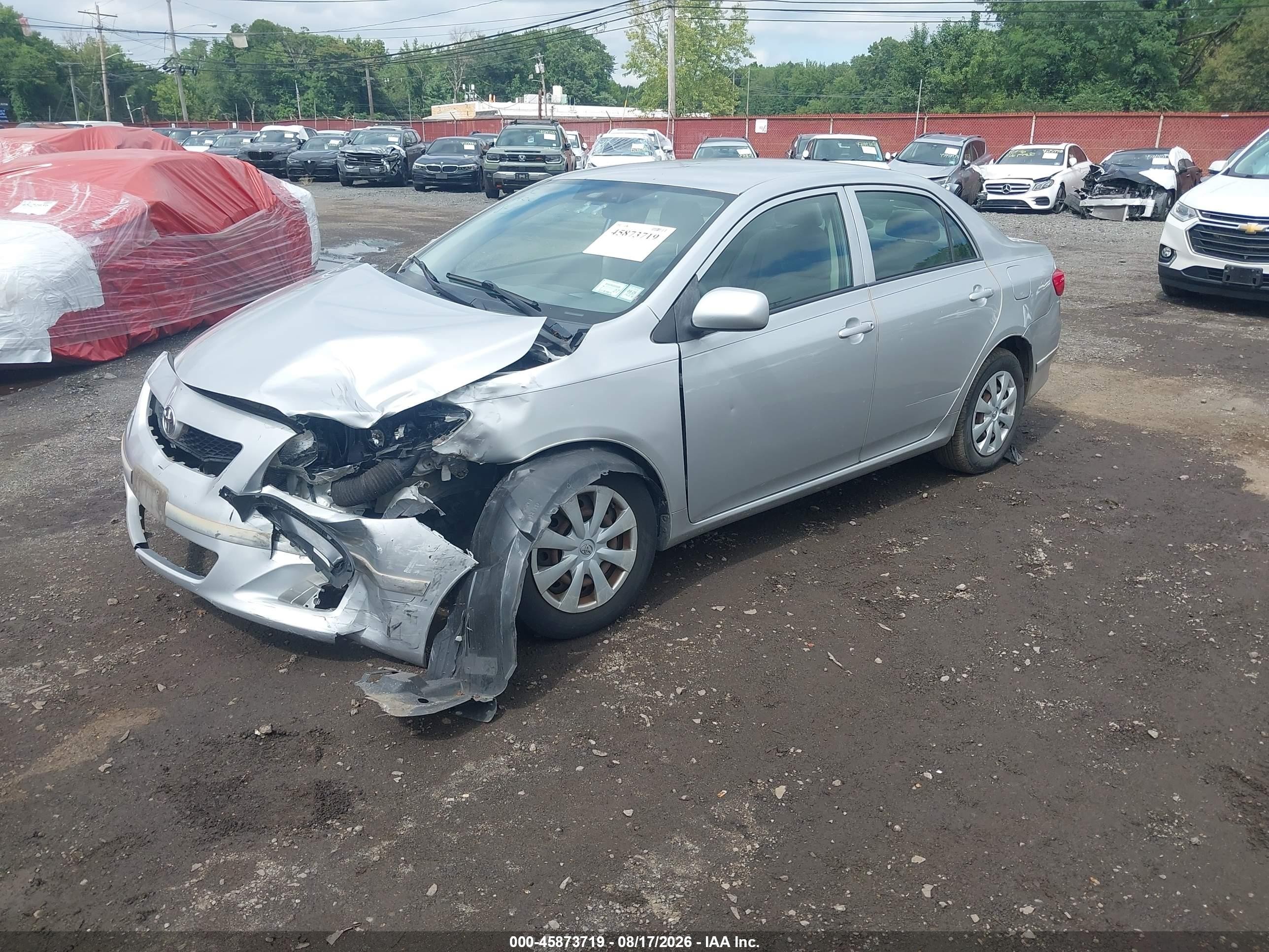 2010 Toyota Corolla Le Серебряный vin: JTDBU4EE2AJ055974