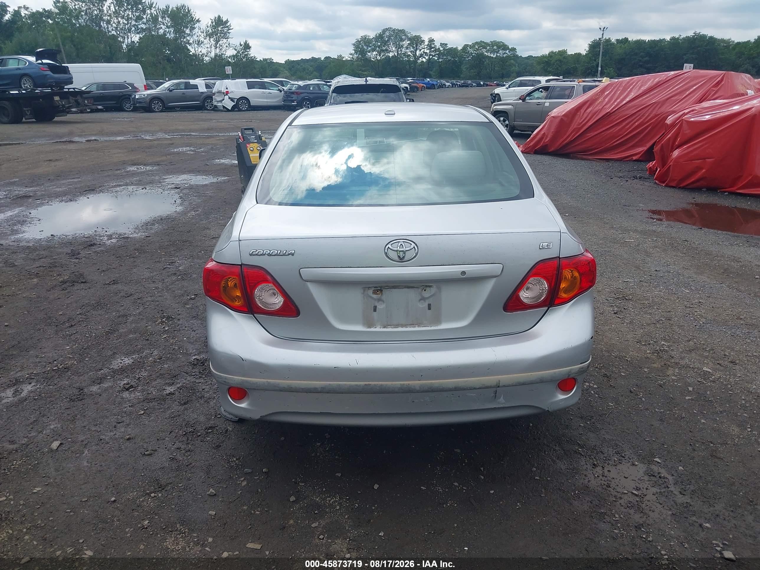 2010 Toyota Corolla Le Серебряный vin: JTDBU4EE2AJ055974