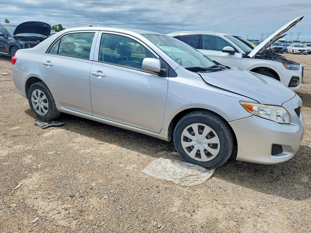 2010 Toyota Corolla Le Silver vin: JTDBU4EE2AJ056283