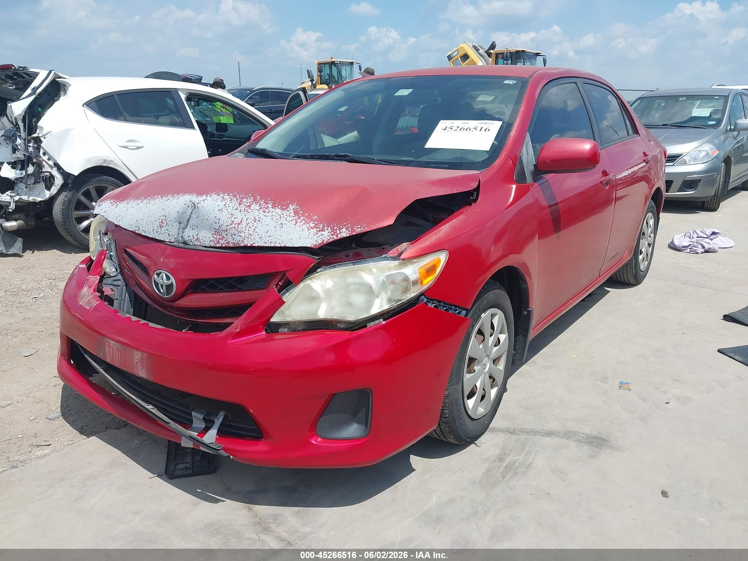 2011 Toyota Corolla Le Red vin: JTDBU4EE2BJ107105