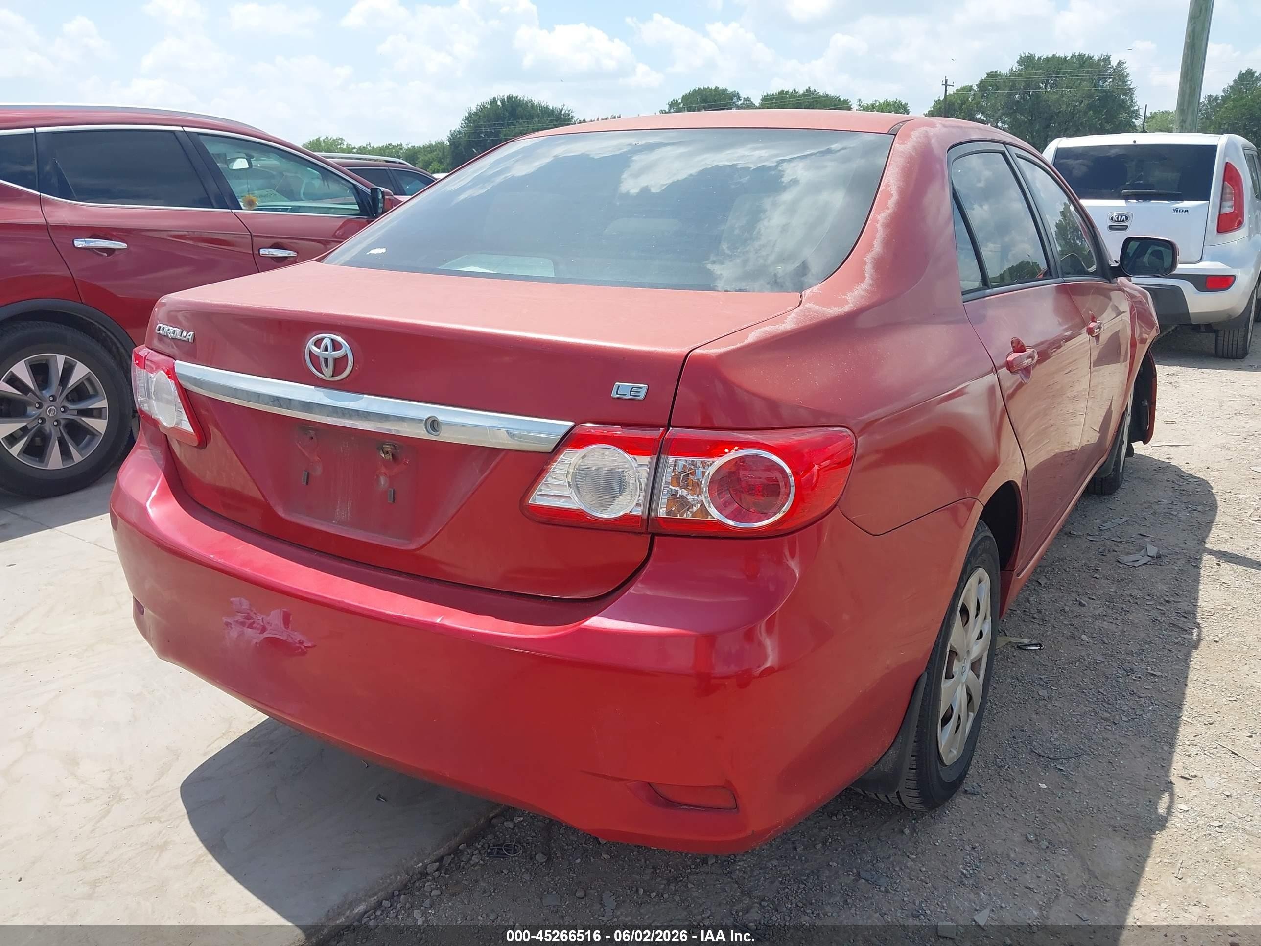 2011 Toyota Corolla Le Red vin: JTDBU4EE2BJ107105