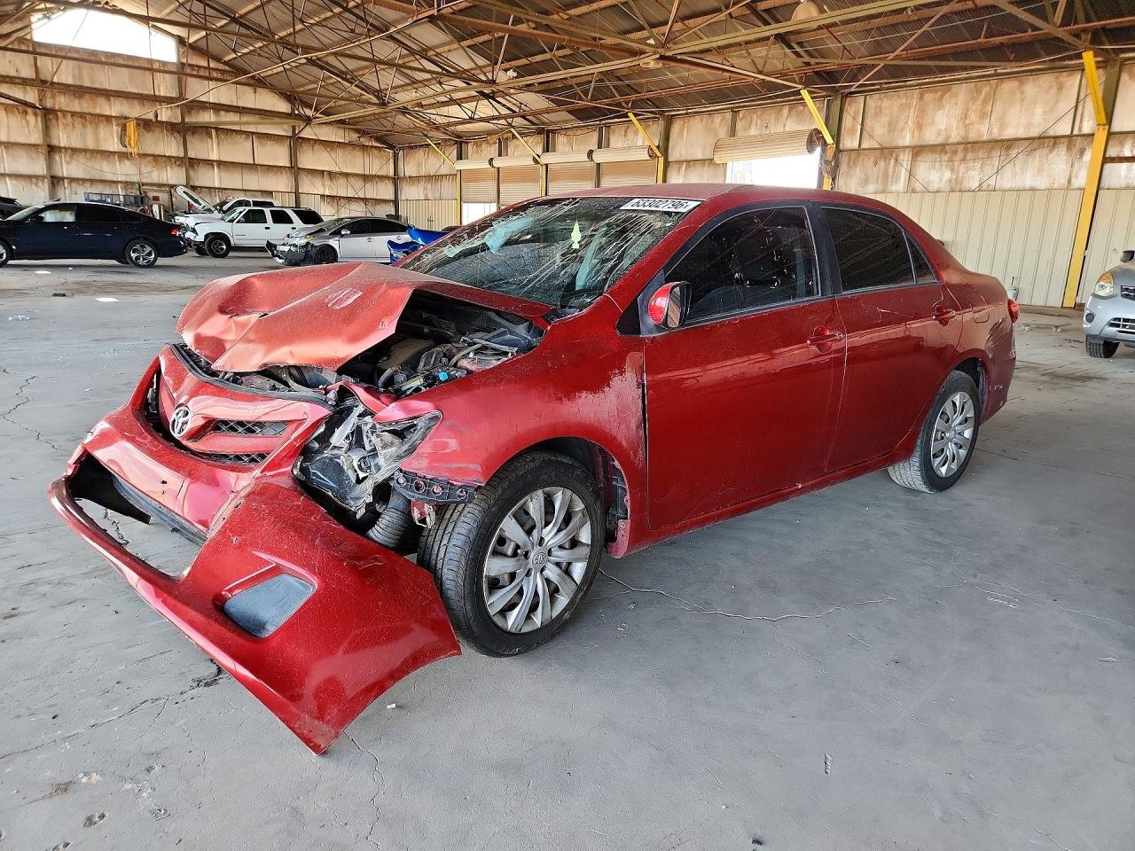 2012 Toyota Corolla Le Red vin: JTDBU4EE2C9180820