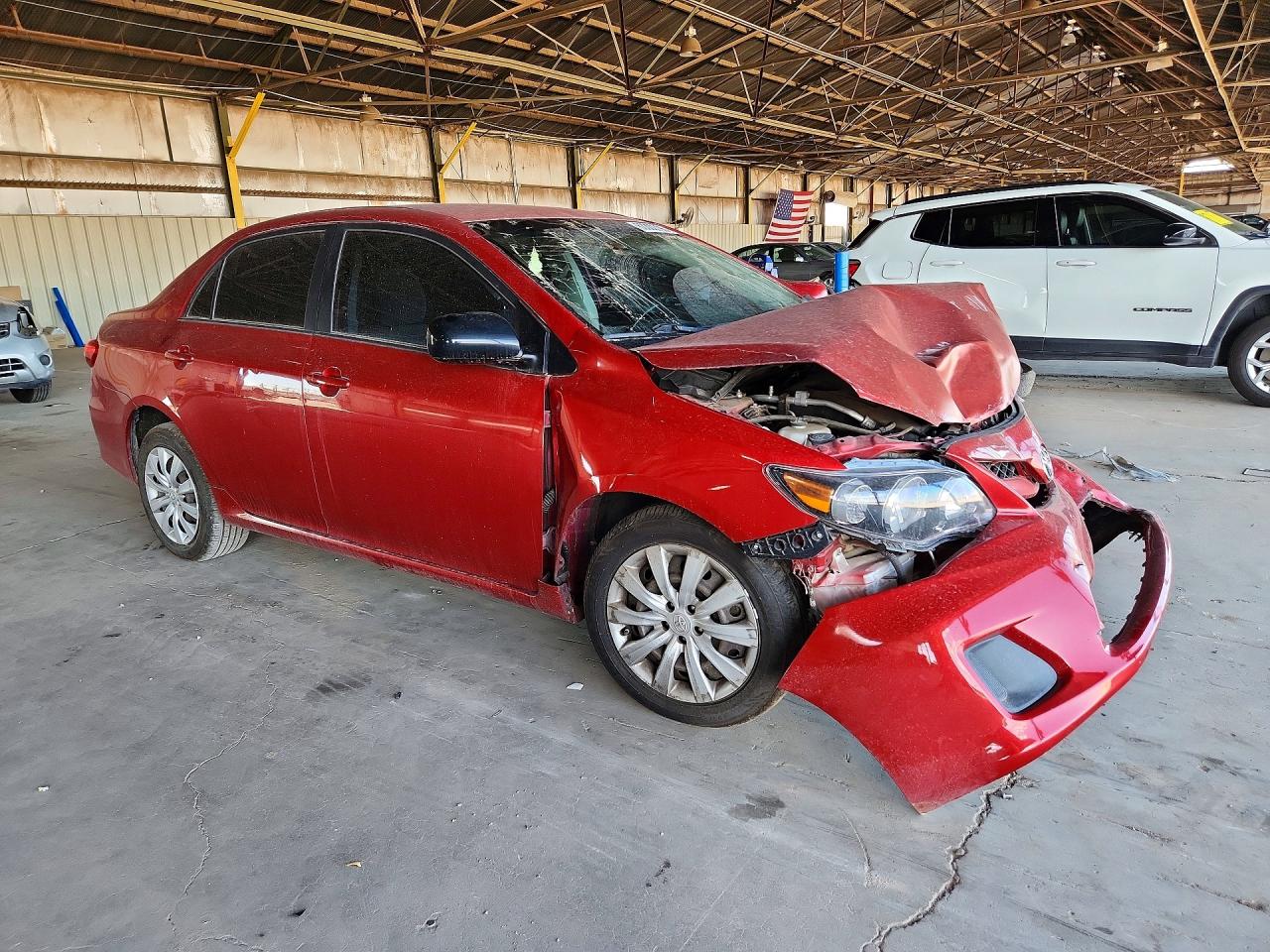 2012 Toyota Corolla Le Red vin: JTDBU4EE2C9180820