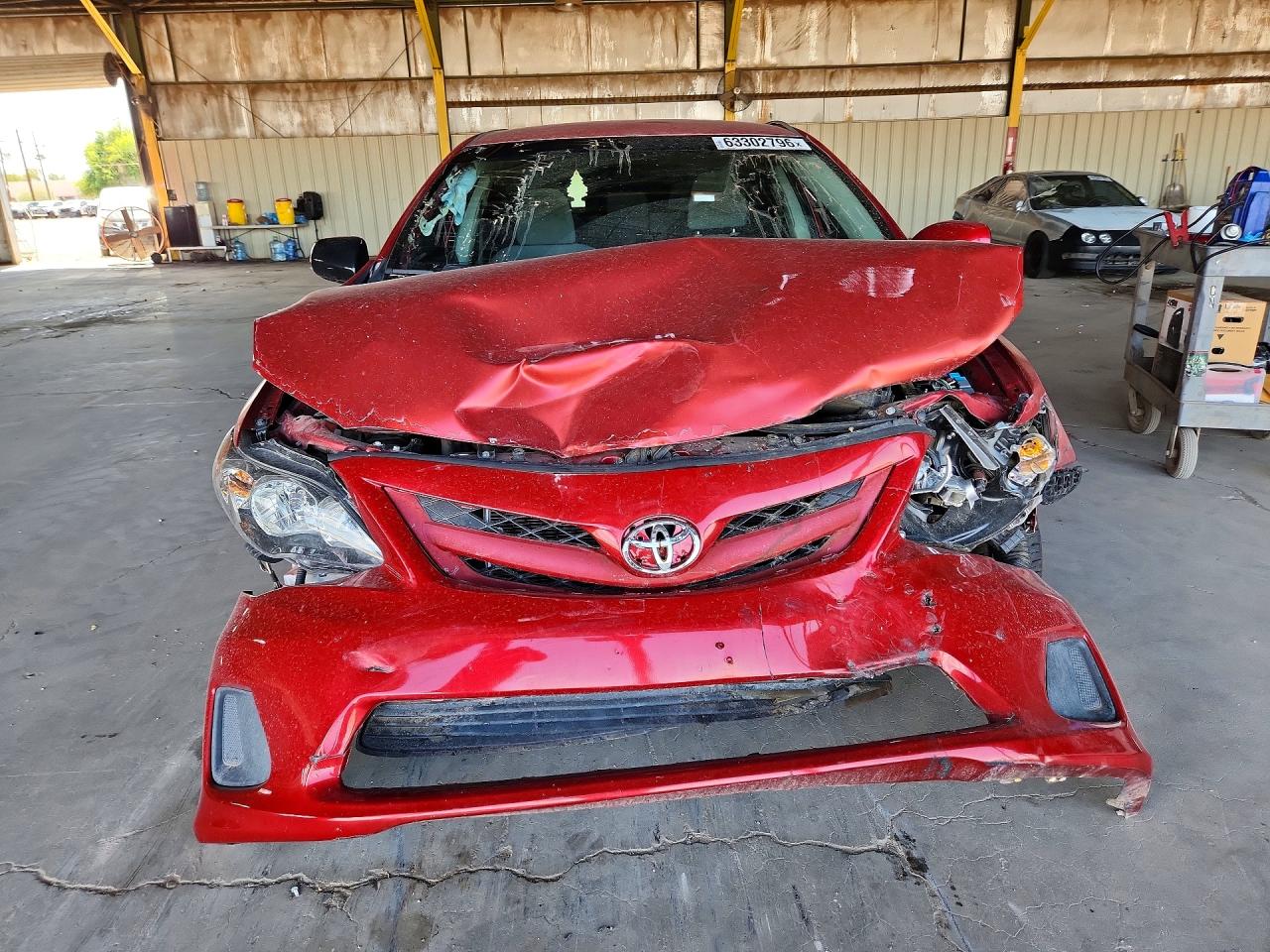 2012 Toyota Corolla Le Red vin: JTDBU4EE2C9180820