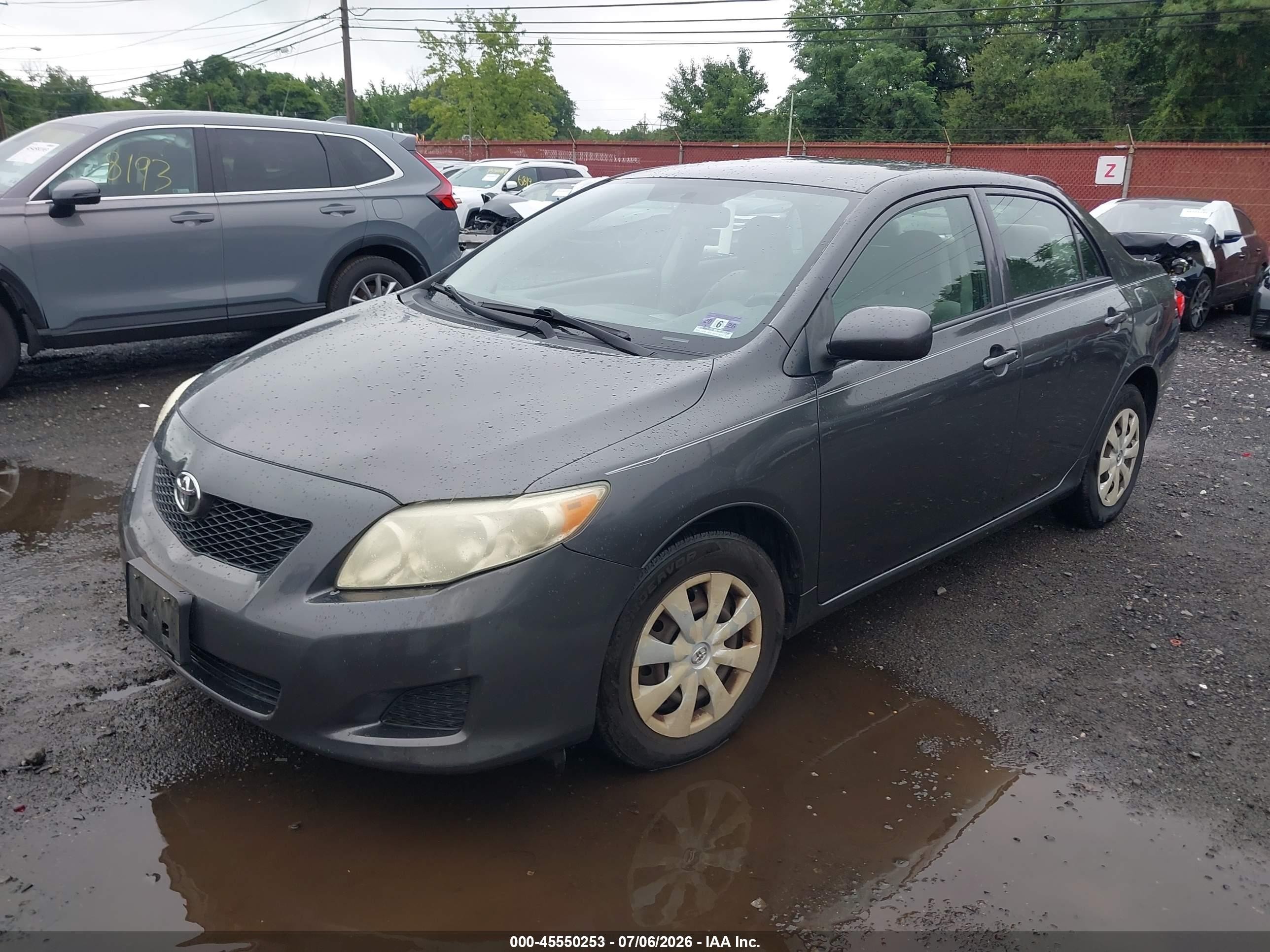 2010 Toyota Corolla Le Gray vin: JTDBU4EE3A9095126