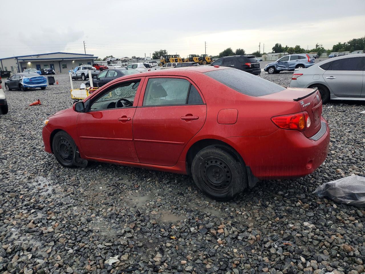 2010 Toyota Corolla Le Red vin: JTDBU4EE3AJ056678