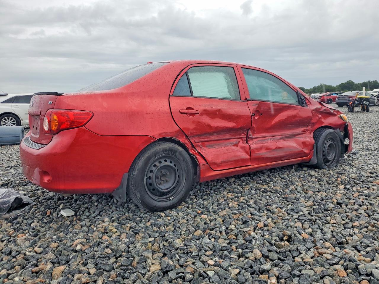 2010 Toyota Corolla Le Red vin: JTDBU4EE3AJ056678