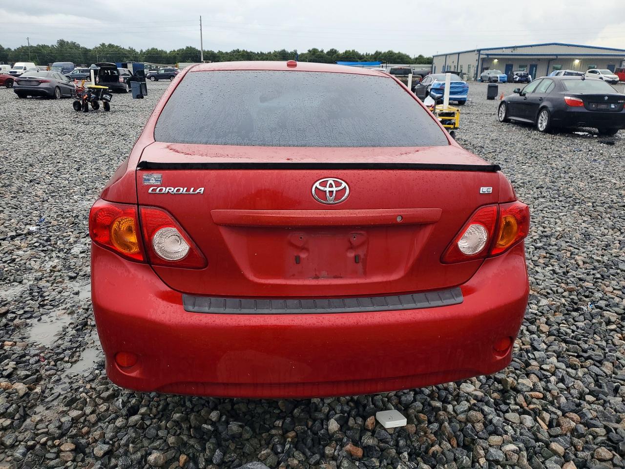 2010 Toyota Corolla Le Red vin: JTDBU4EE3AJ056678