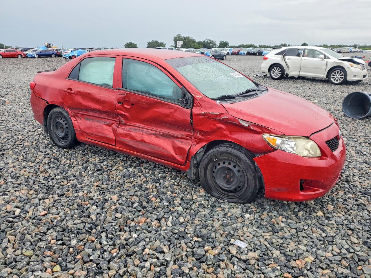 2010 Toyota Corolla Le Red vin: JTDBU4EE3AJ056678
