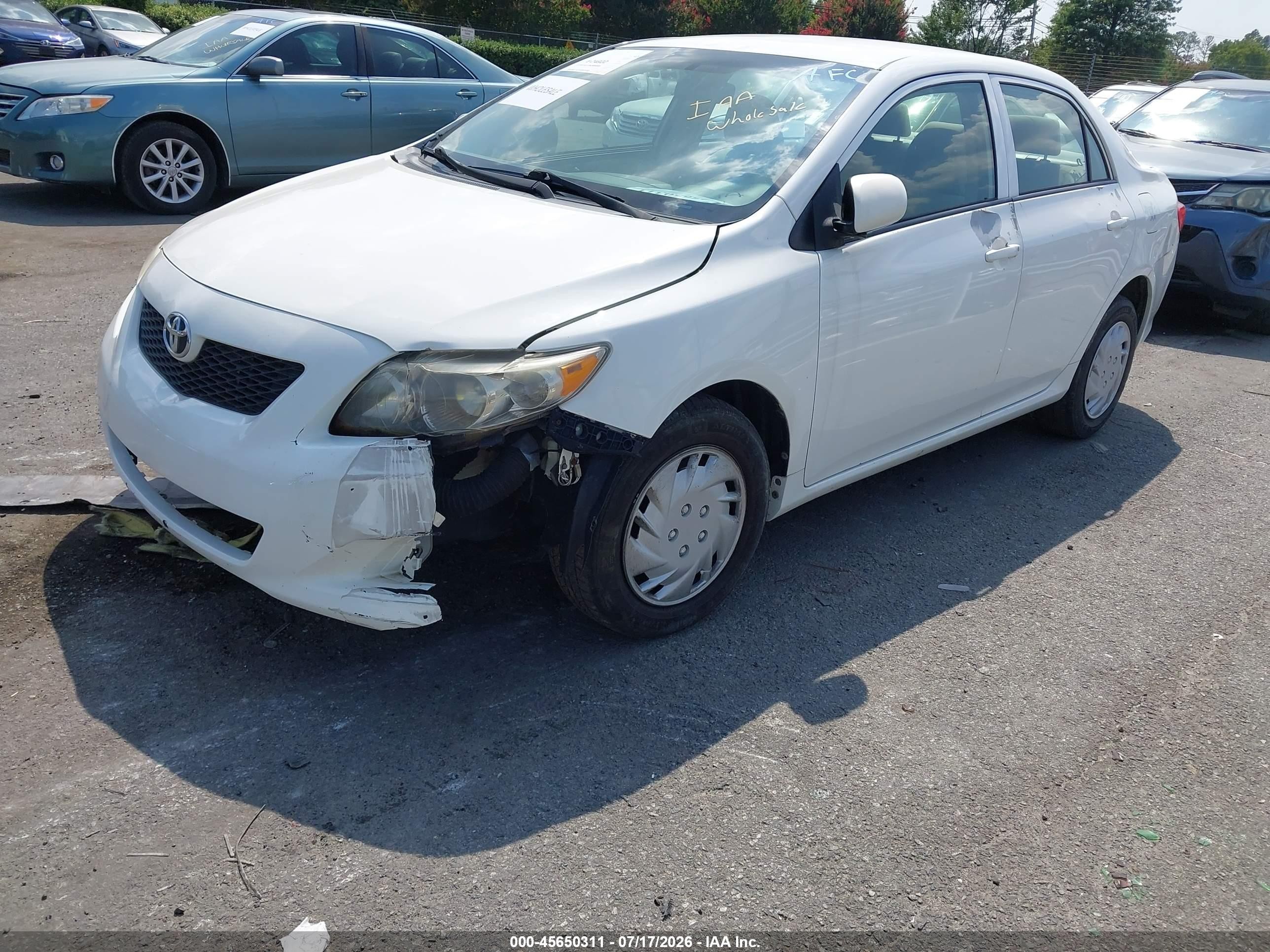 2010 Toyota Corolla Le White vin: JTDBU4EE3AJ086005