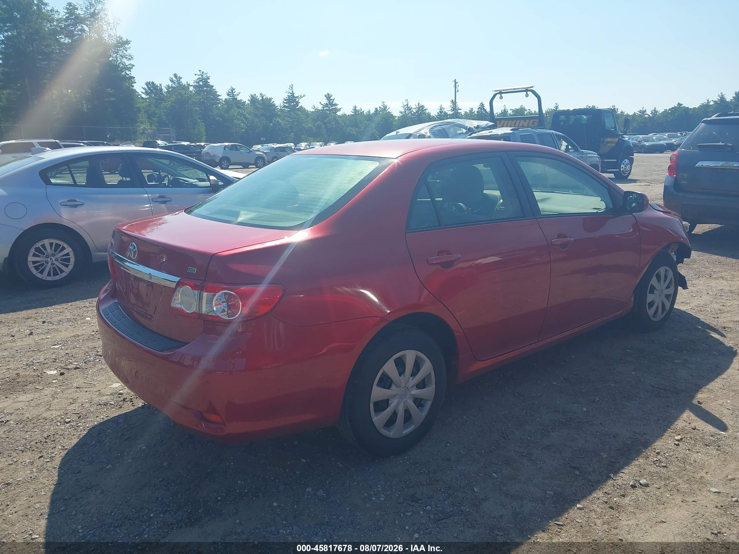 2011 Toyota Corolla Le Red vin: JTDBU4EE3B9138610