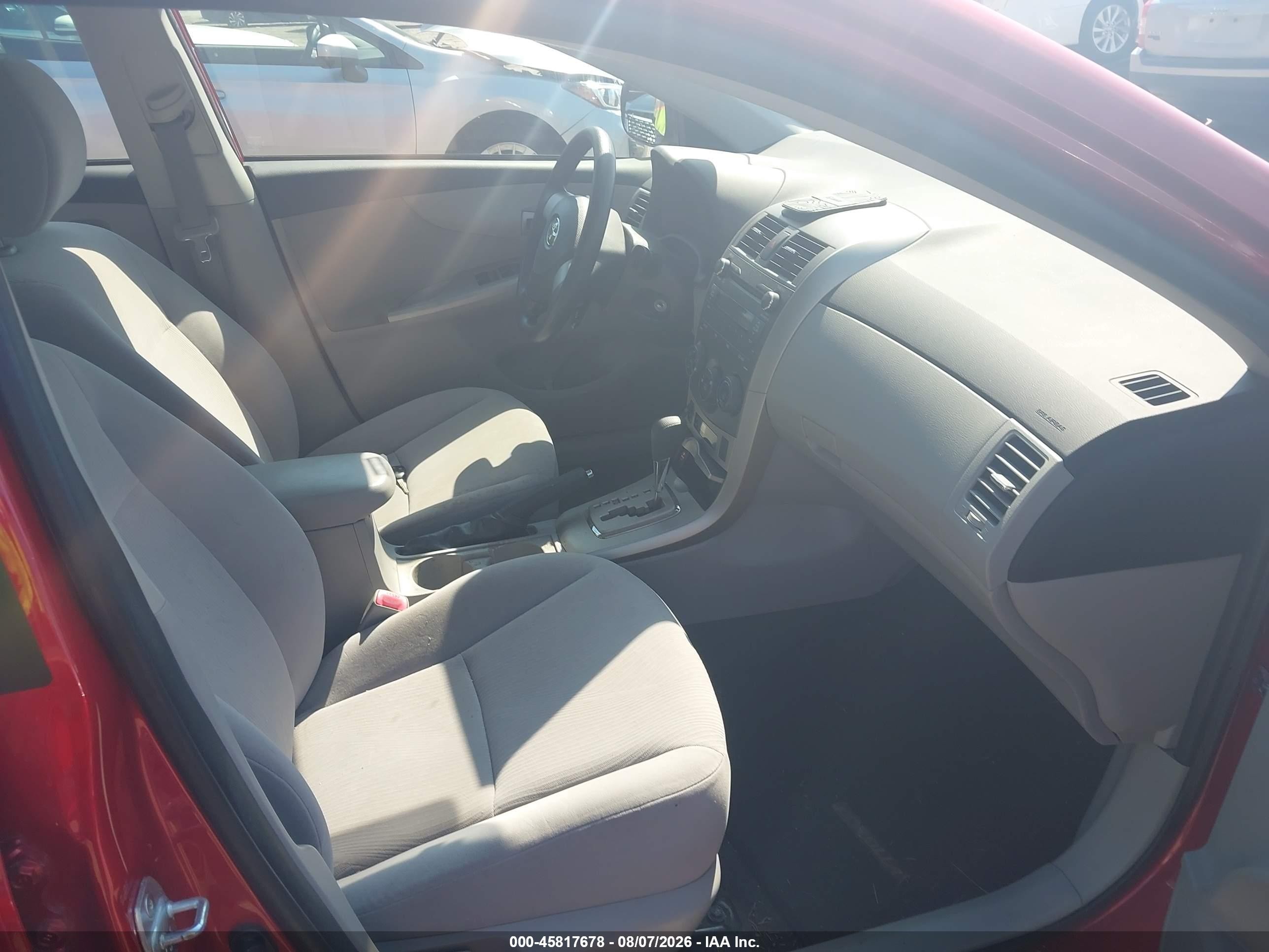 2011 Toyota Corolla Le Red vin: JTDBU4EE3B9138610