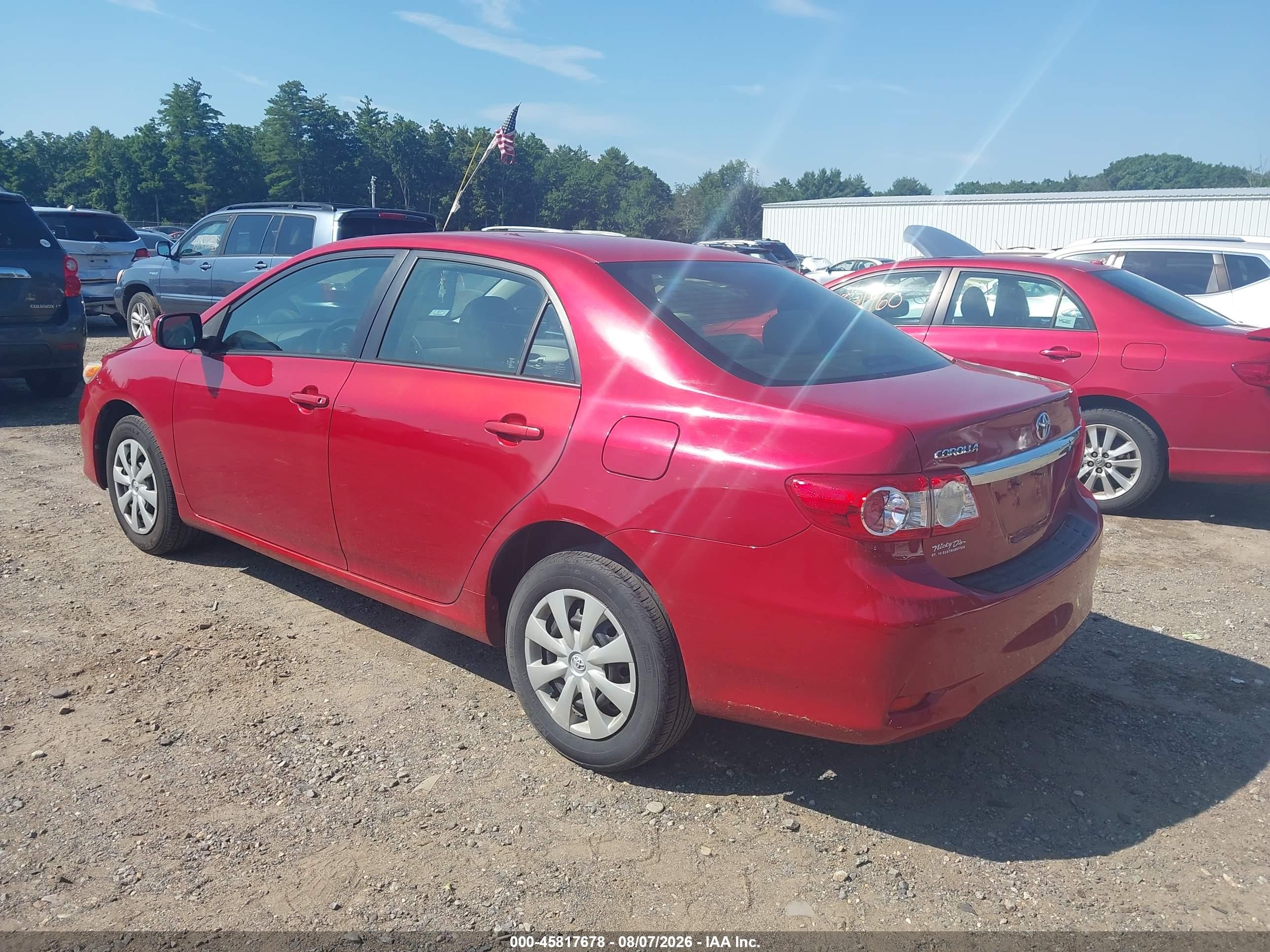 2011 Toyota Corolla Le Red vin: JTDBU4EE3B9138610