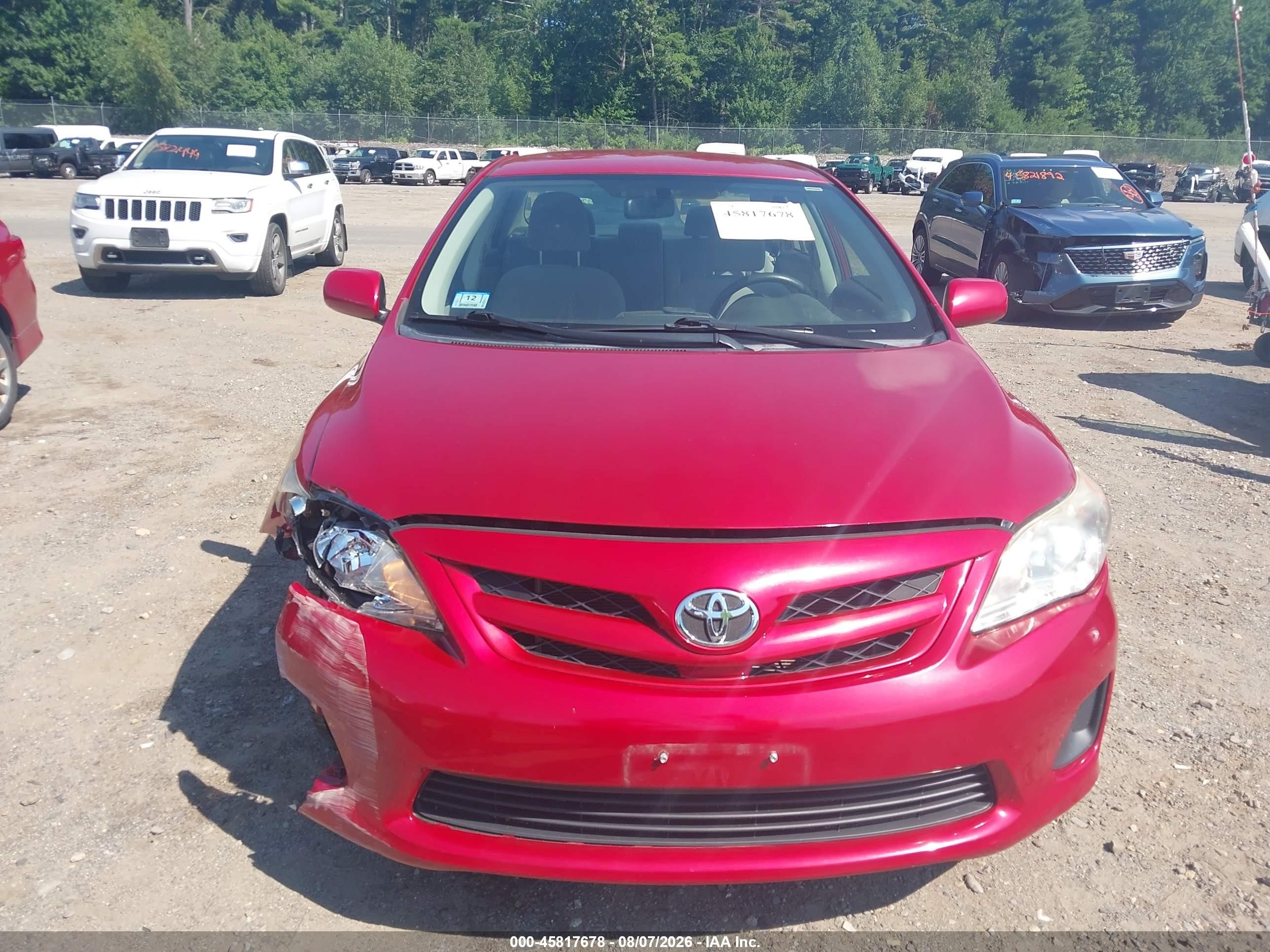 2011 Toyota Corolla Le Red vin: JTDBU4EE3B9138610