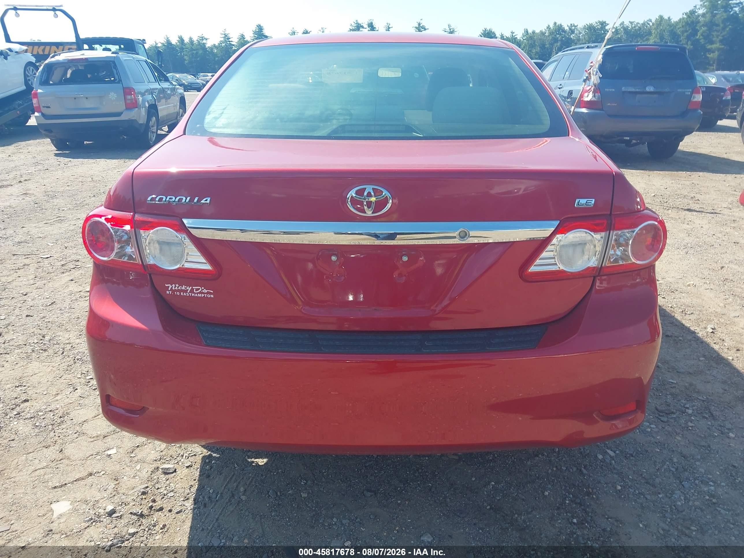 2011 Toyota Corolla Le Red vin: JTDBU4EE3B9138610