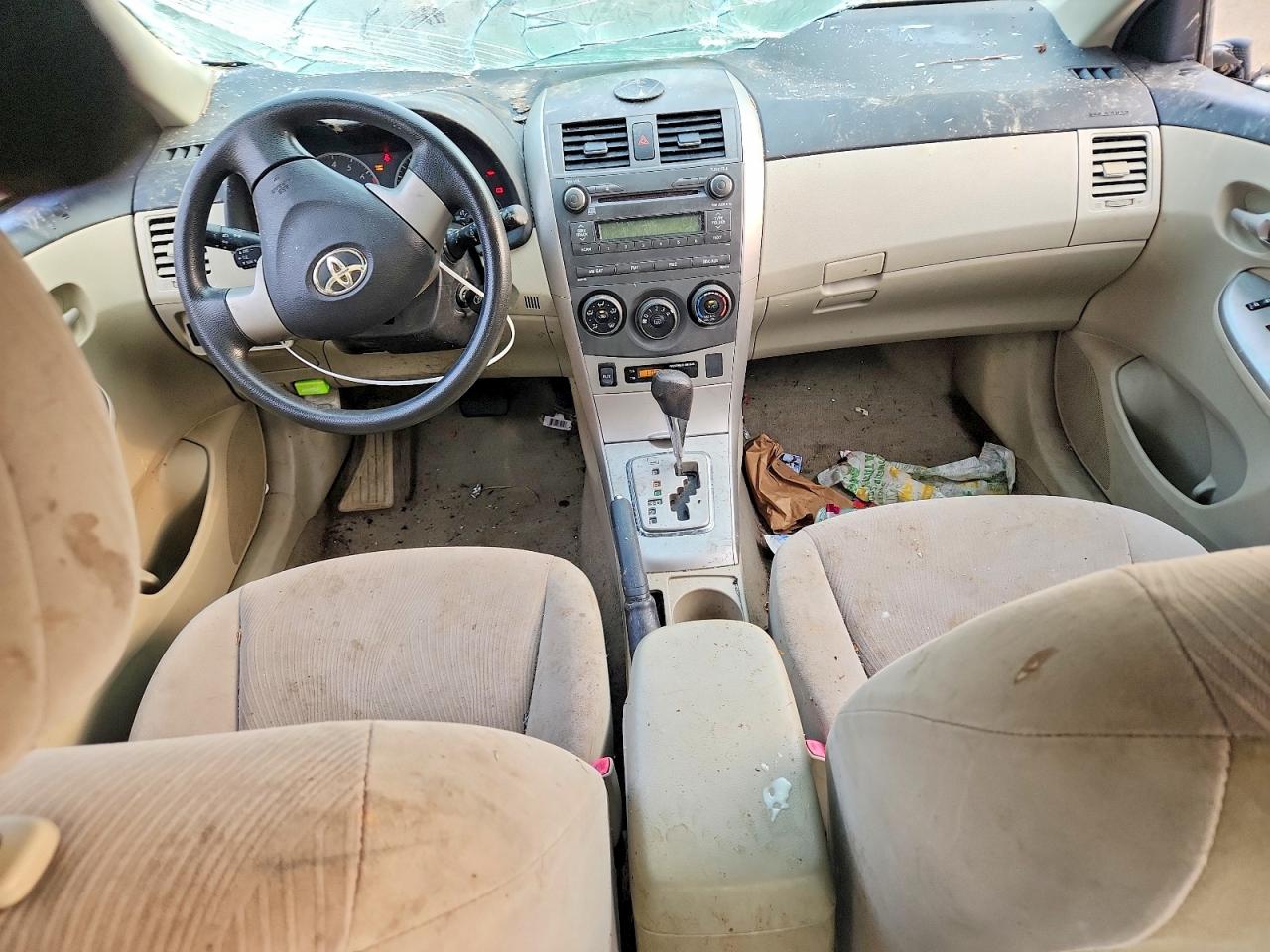 2011 Toyota Corolla Le Beige vin: JTDBU4EE3B9140311