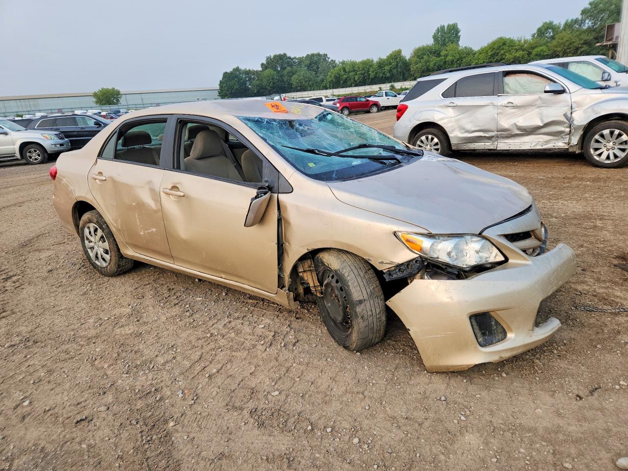 2011 Toyota Corolla Le Beige vin: JTDBU4EE3B9140311