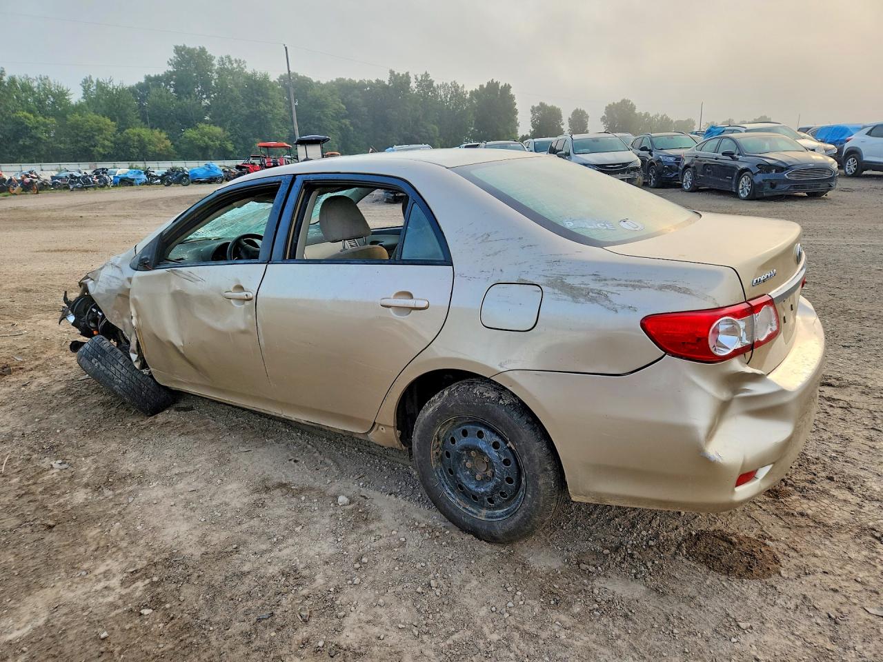 2011 Toyota Corolla Le Beige vin: JTDBU4EE3B9140311