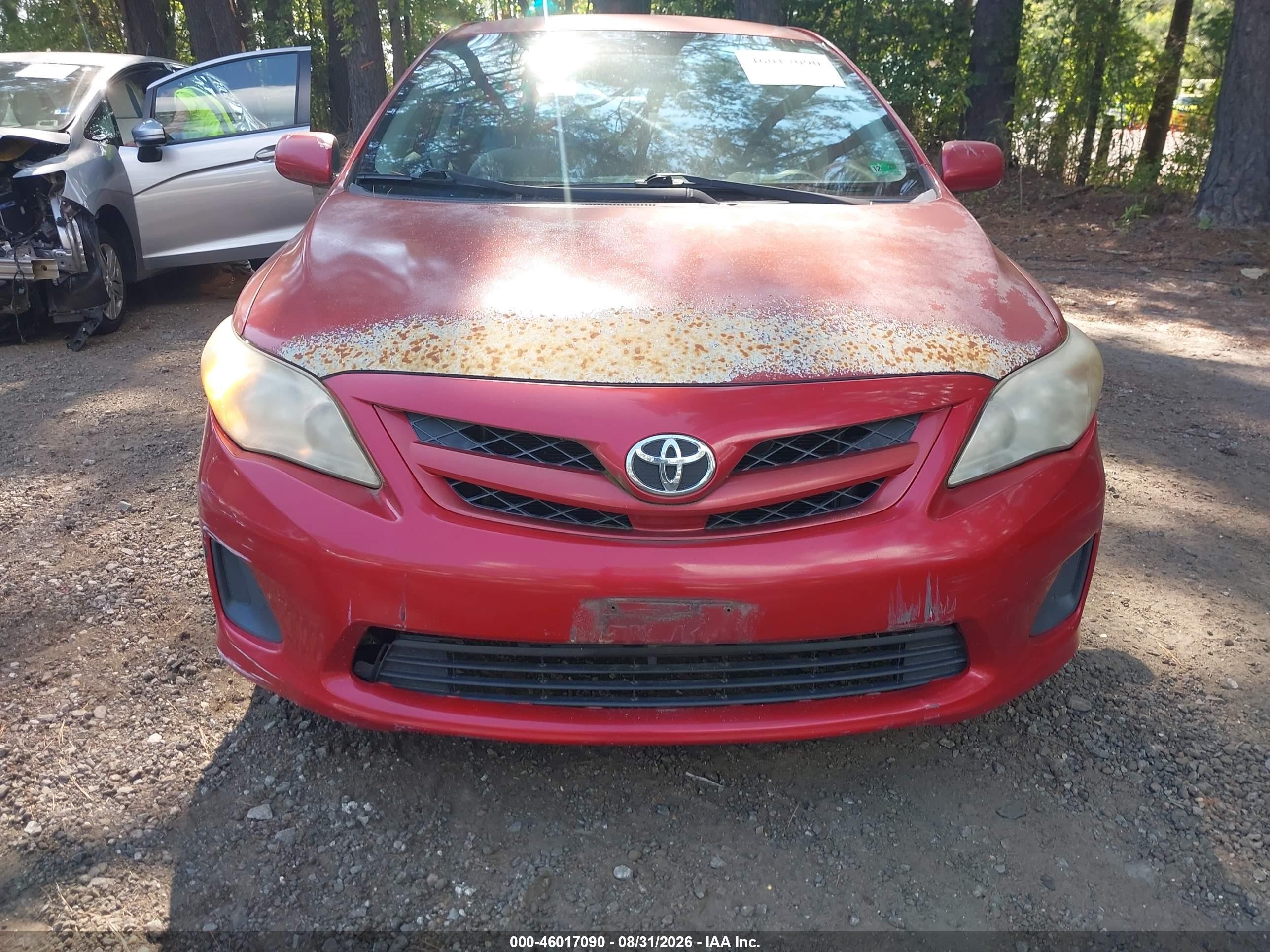 2011 Toyota Corolla Le Red vin: JTDBU4EE3BJ098852